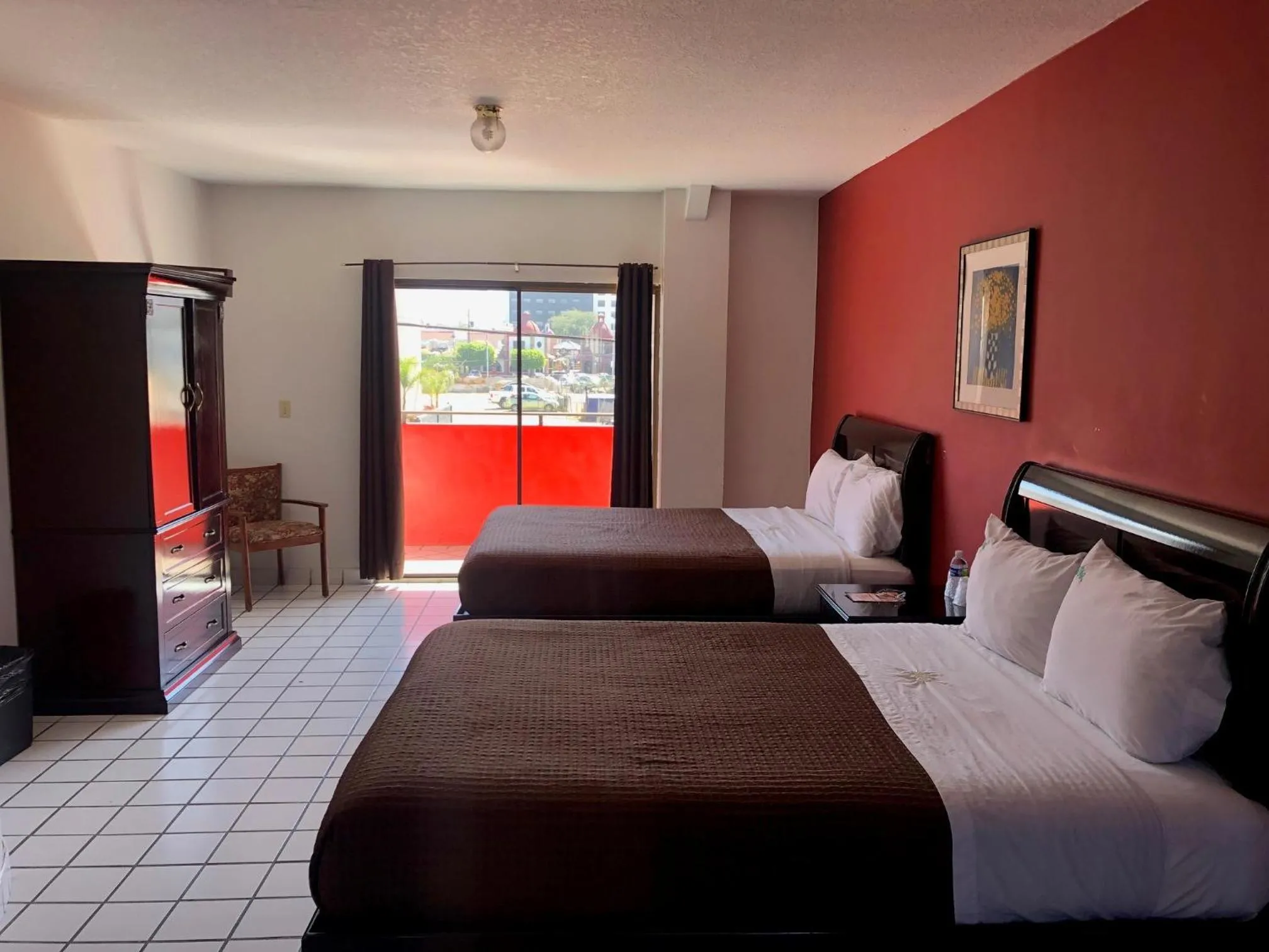 Bed in HOTEL BUGAMBILIAS