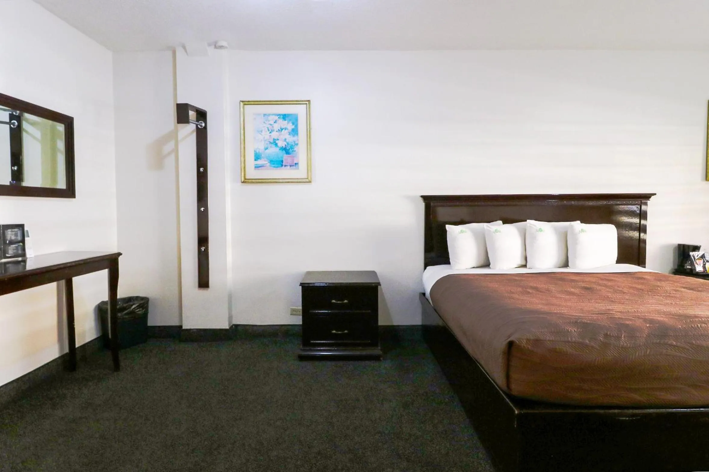 Bed in HOTEL BUGAMBILIAS