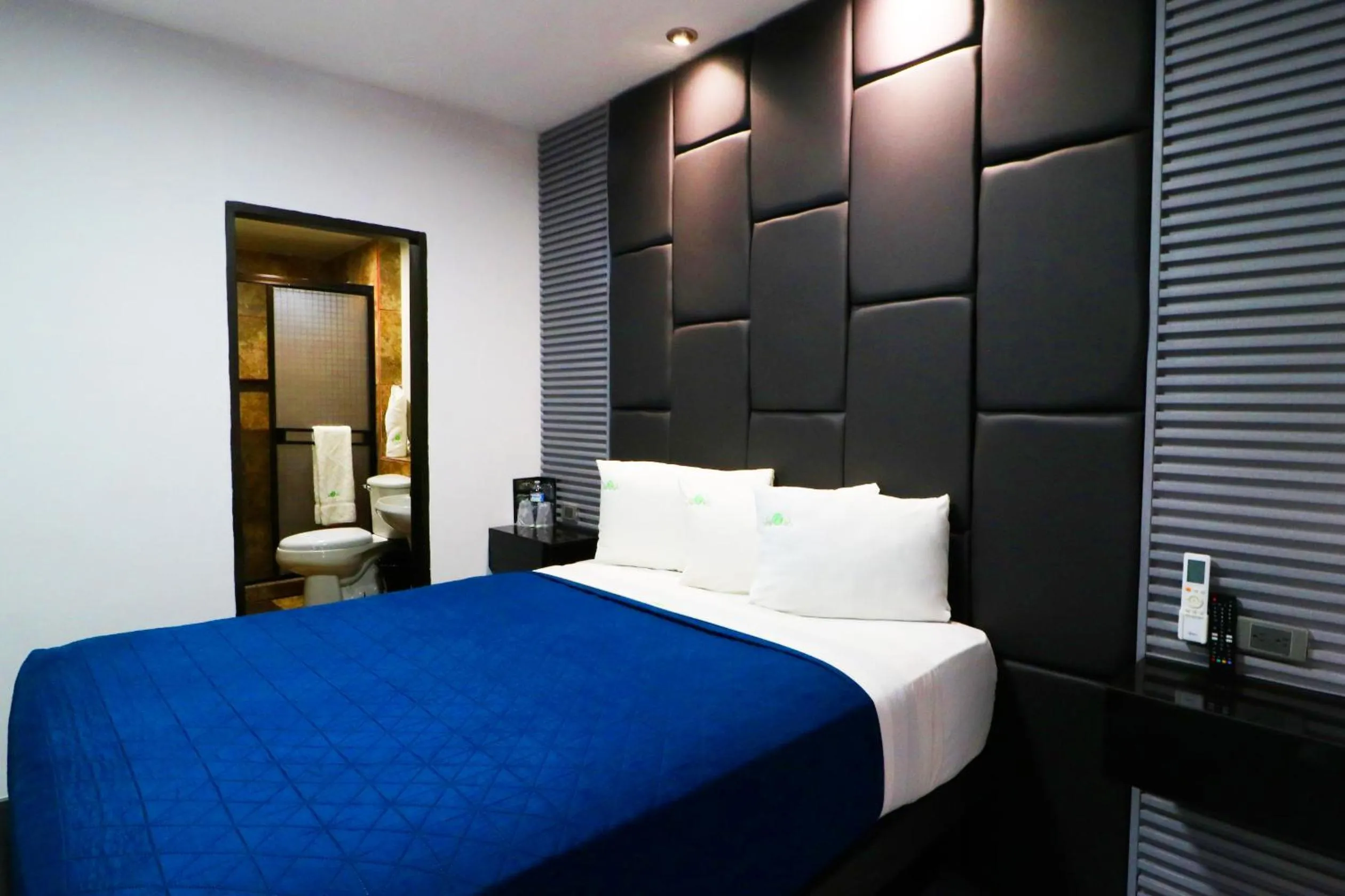 Bed in HOTEL BUGAMBILIAS