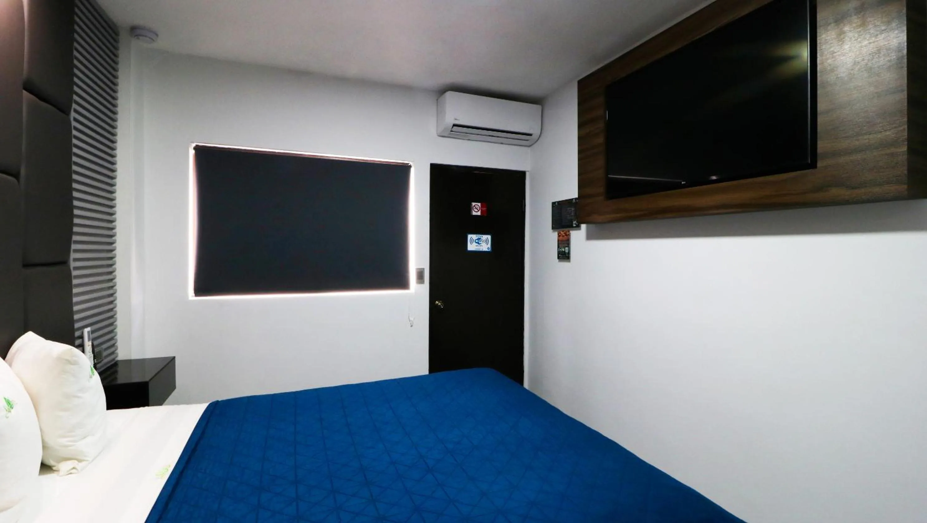 Bed in HOTEL BUGAMBILIAS