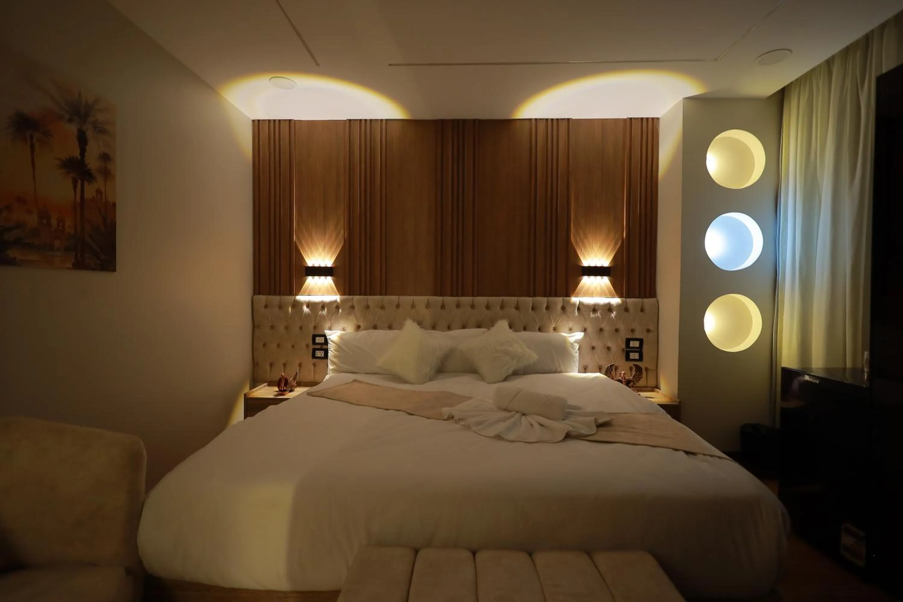 Bed in The Muse Pyramids INN