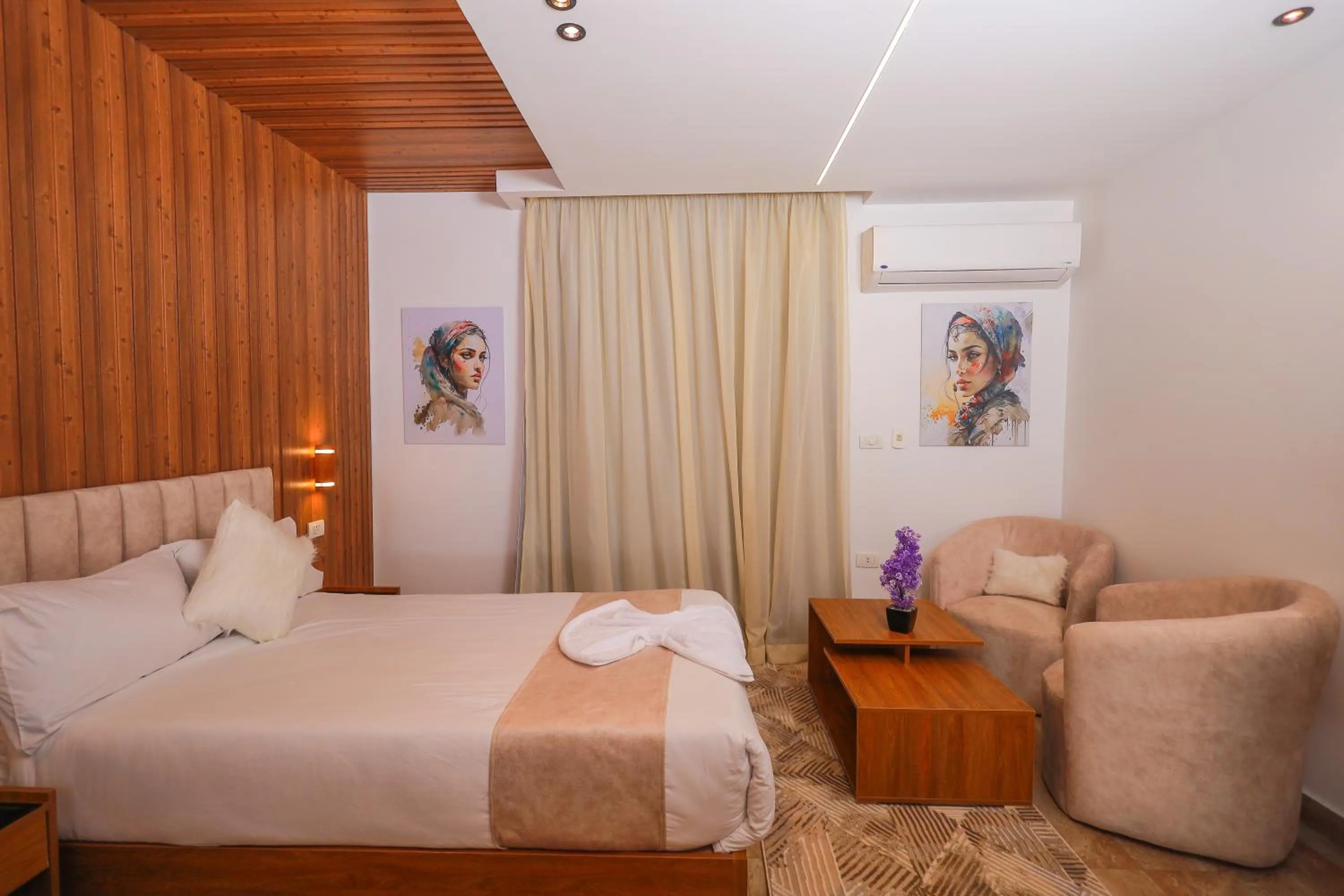 Bed in The Muse Pyramids INN