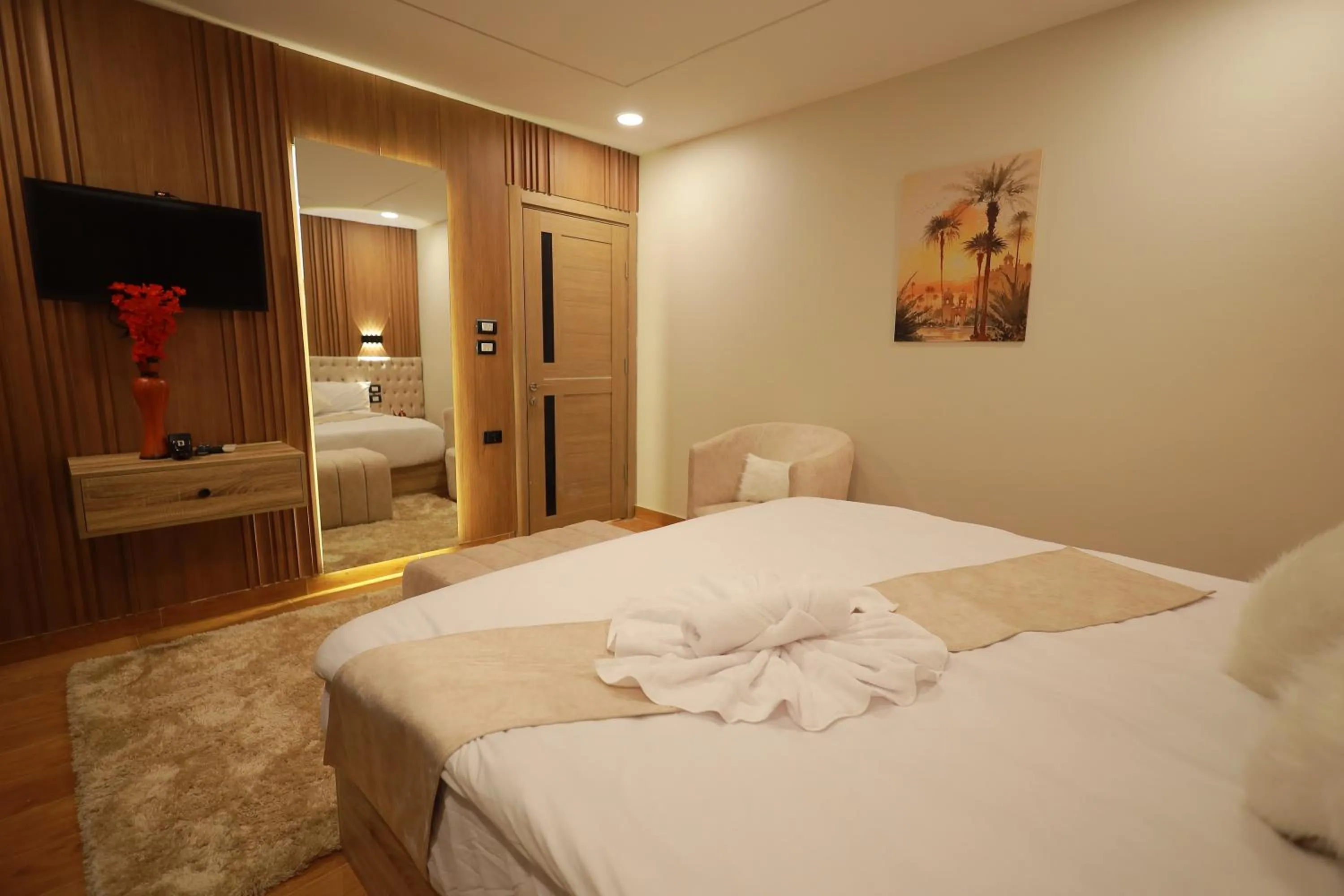 Bed in The Muse Pyramids INN