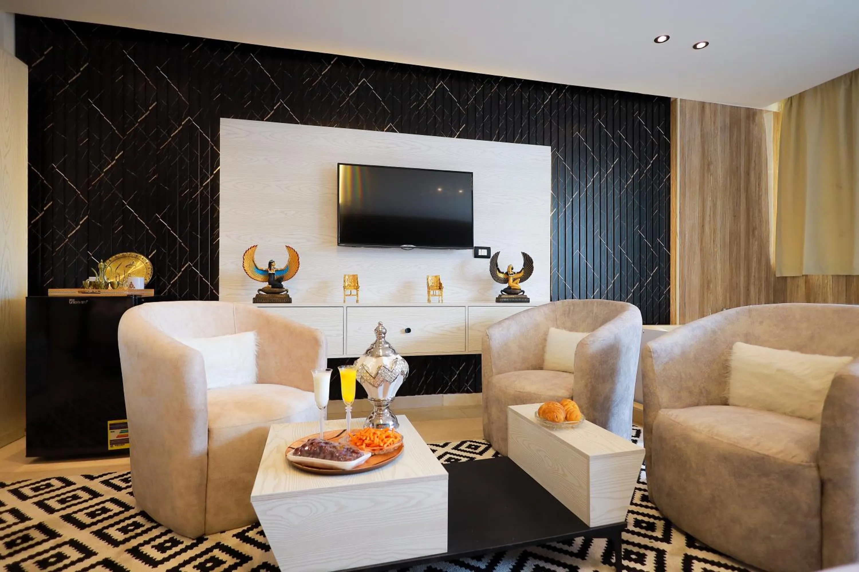 Seating area in The Muse Pyramids INN