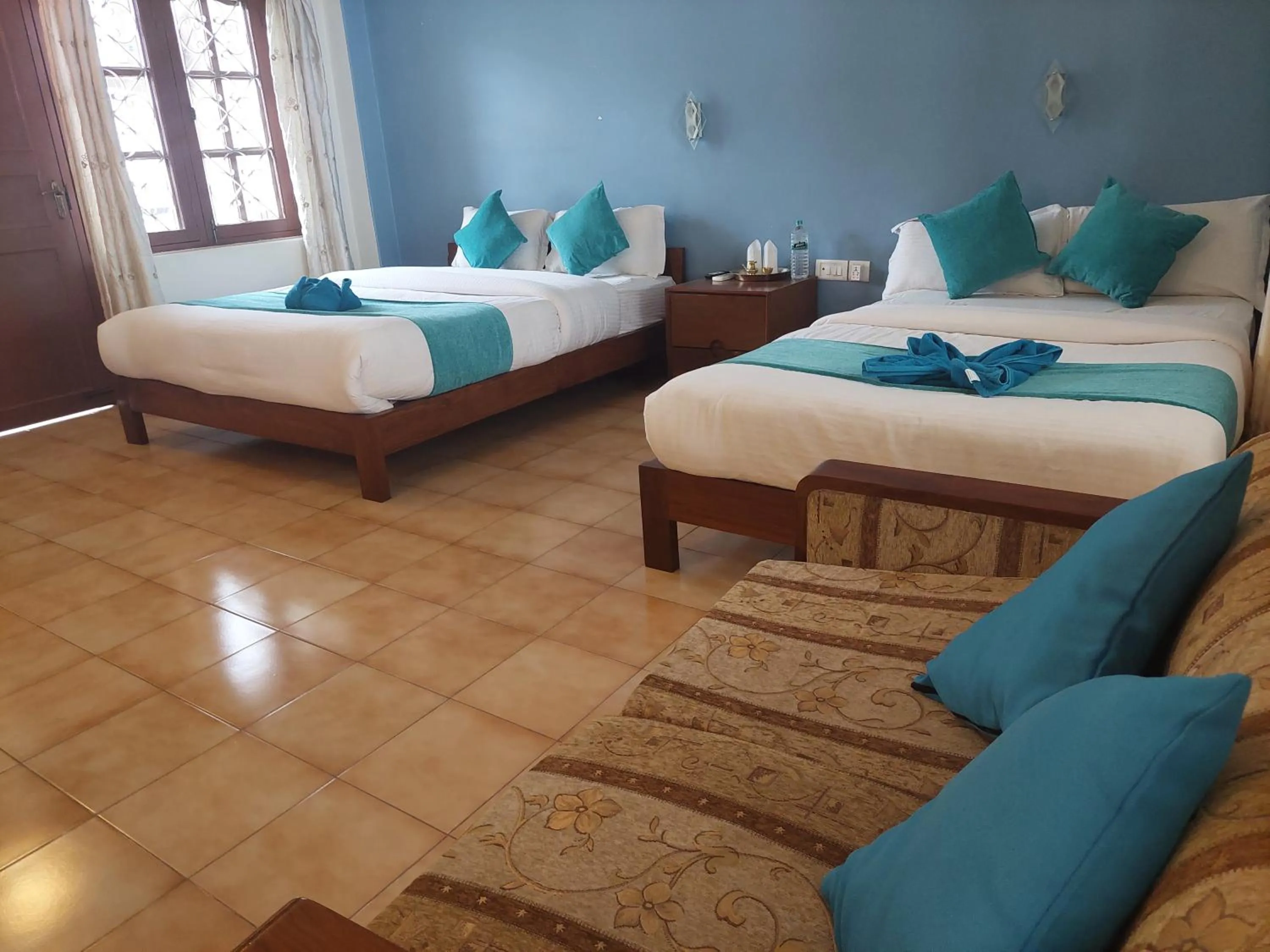 Bed in Blue Planet Lodge & Restaurant