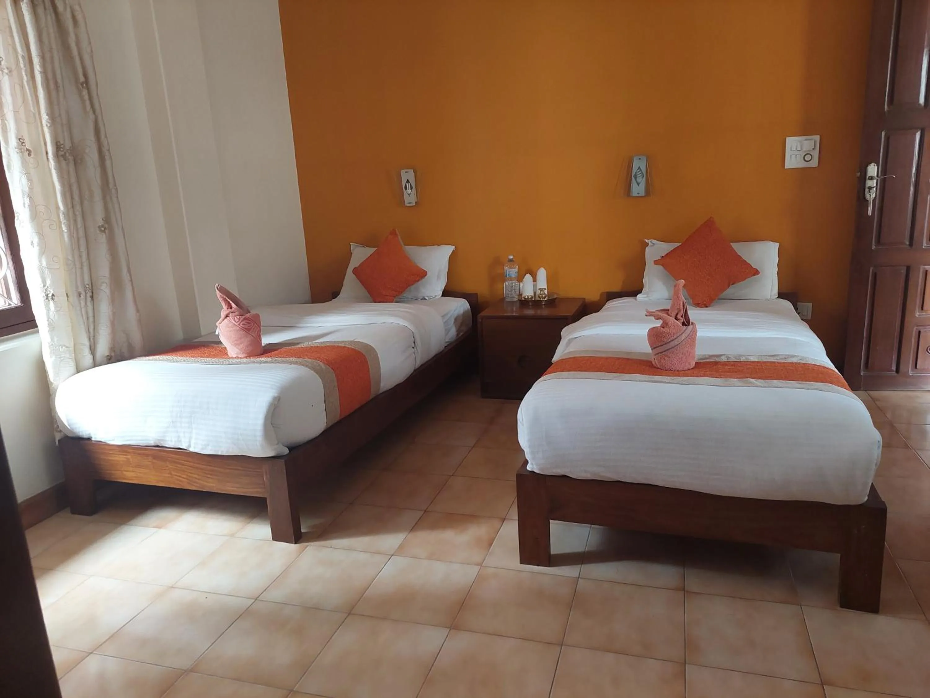 Bed in Blue Planet Lodge & Restaurant