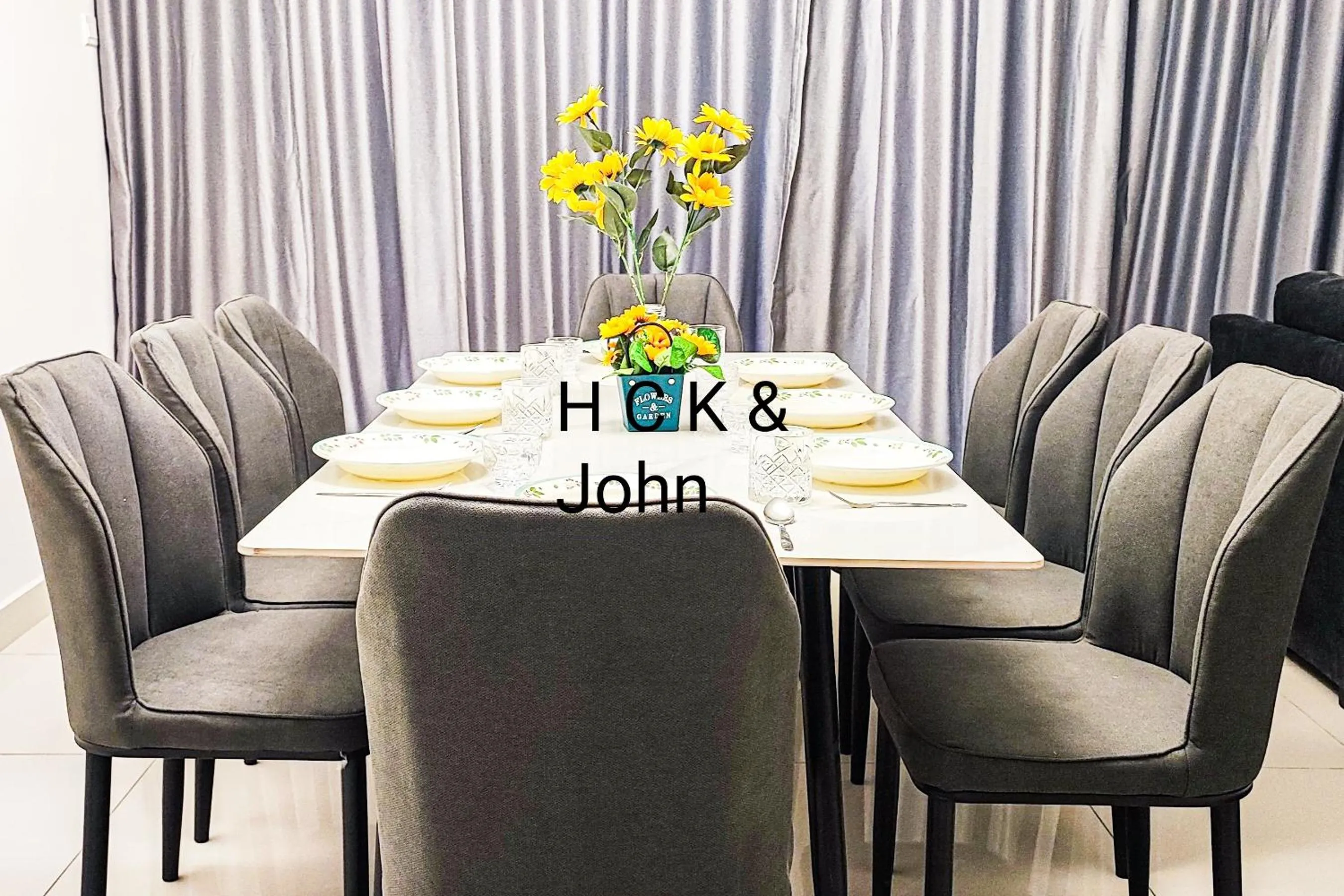 Seating area in Double Storey Pool at Trio Setia by HCK