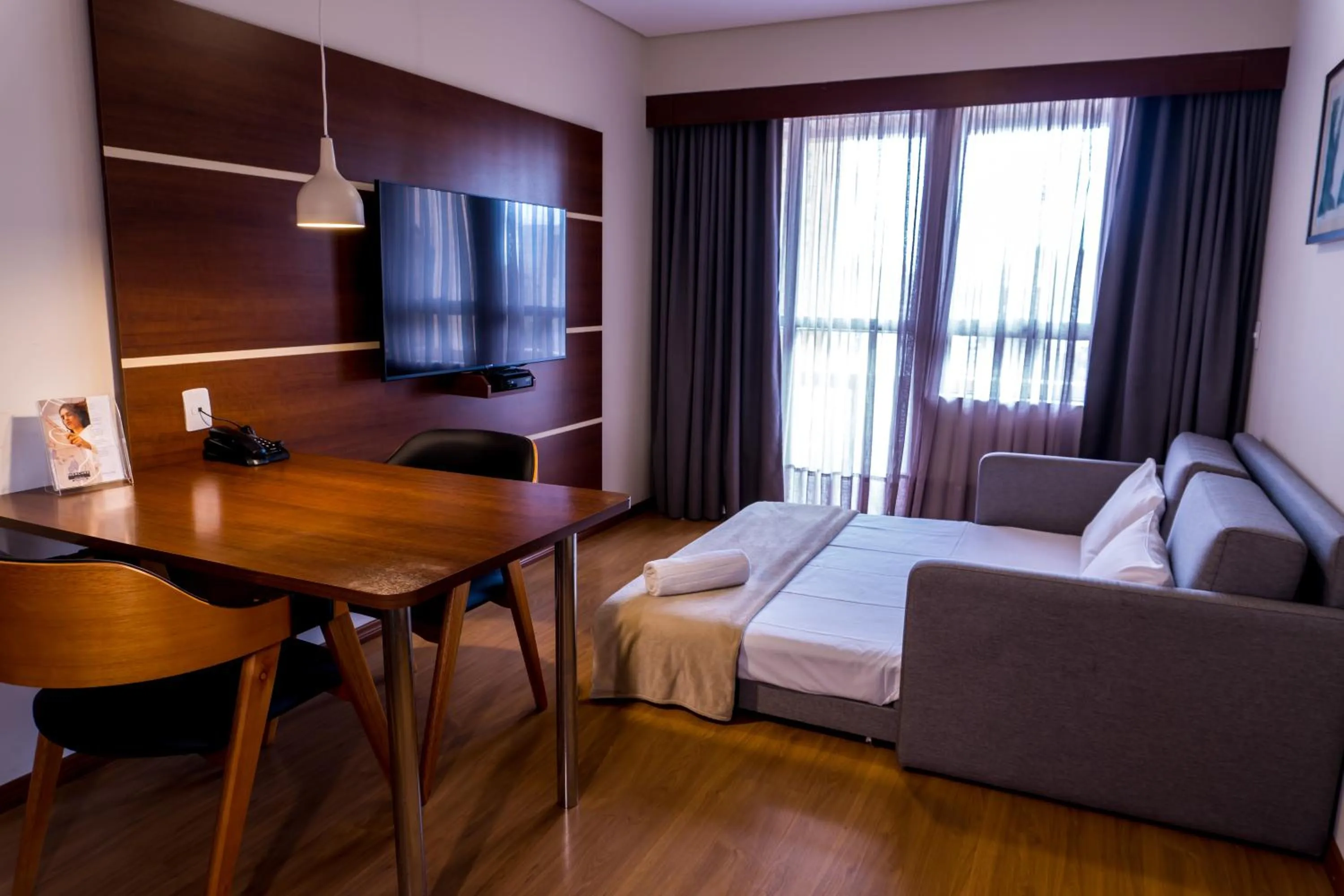 Living room, Bed in Mercure Curitiba Golden