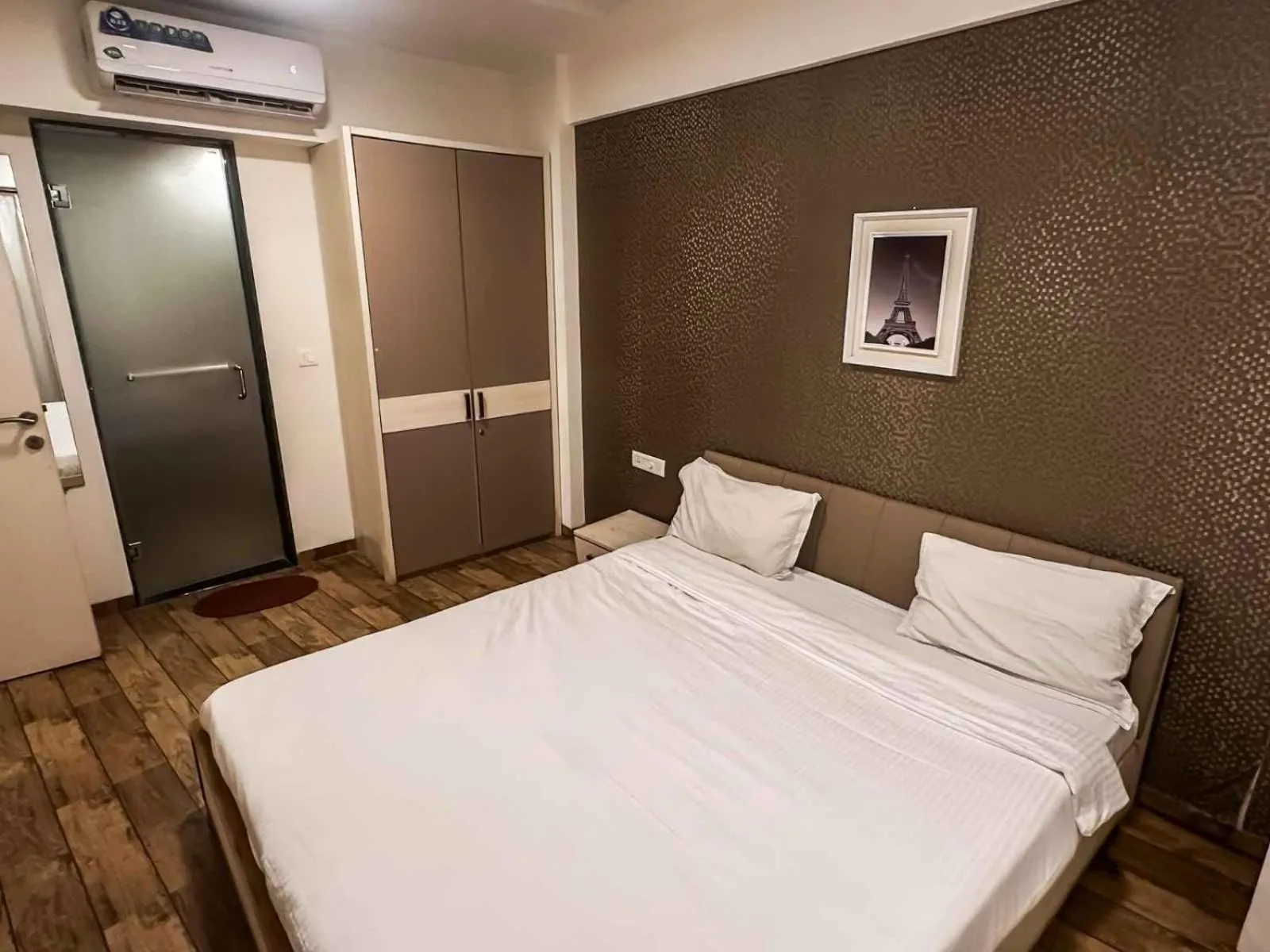 Bed in Ambition studio apartment at rajhans belliza