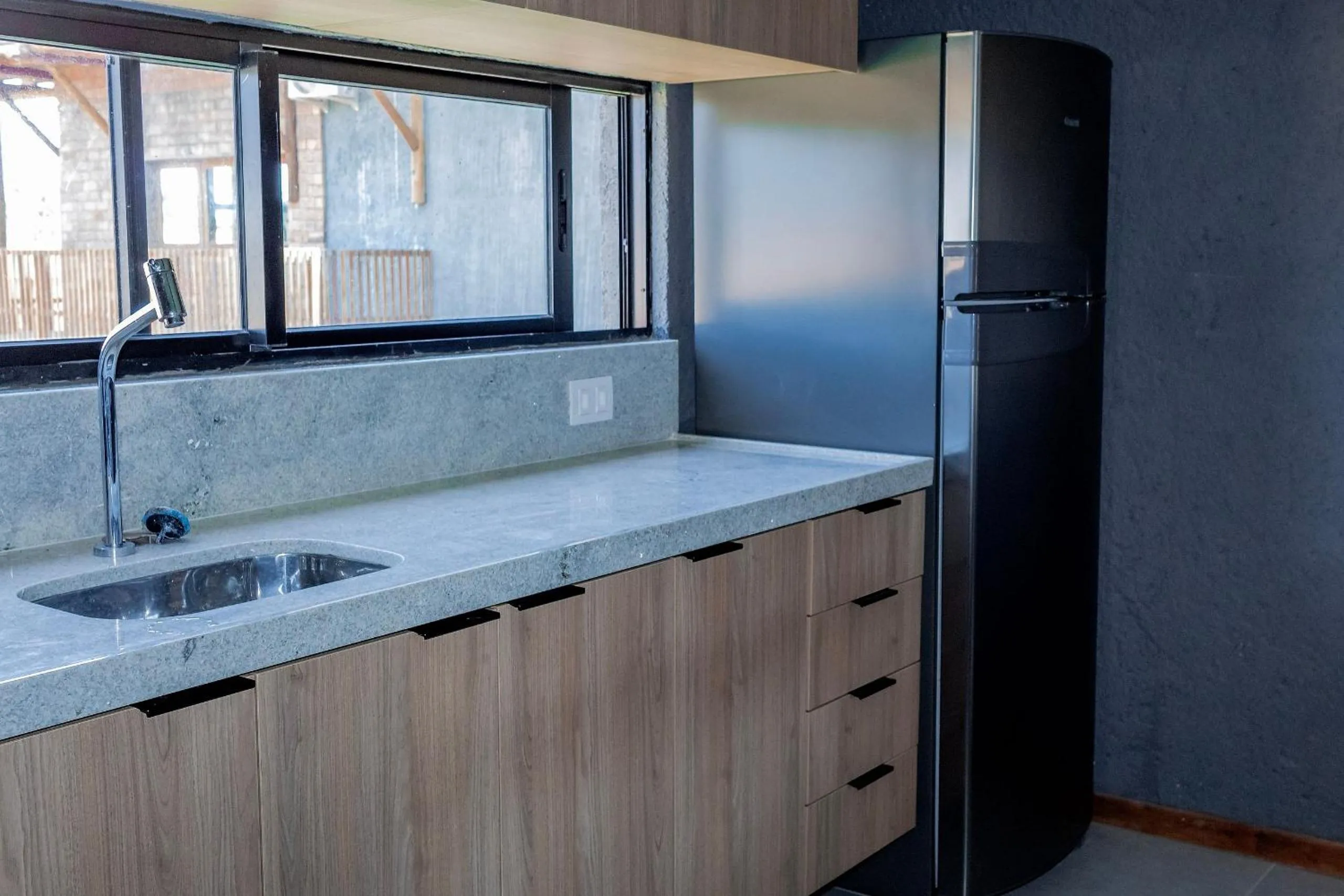 Kitchen or kitchenette in Villas Manatee Milagres por Quarto à Vista