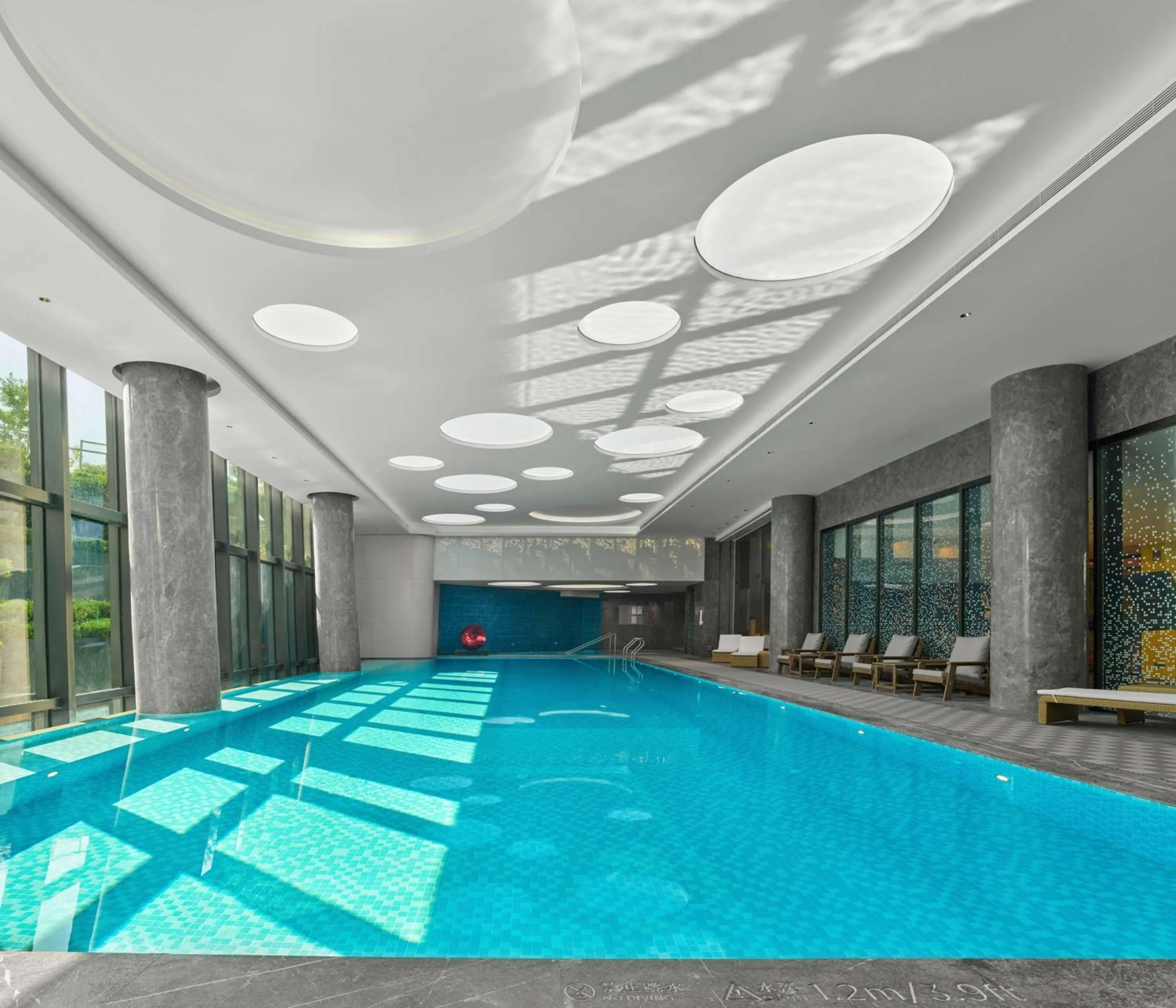 Pool view in Doubletree By Hilton Yantai Golden Coast Hotel & Suites