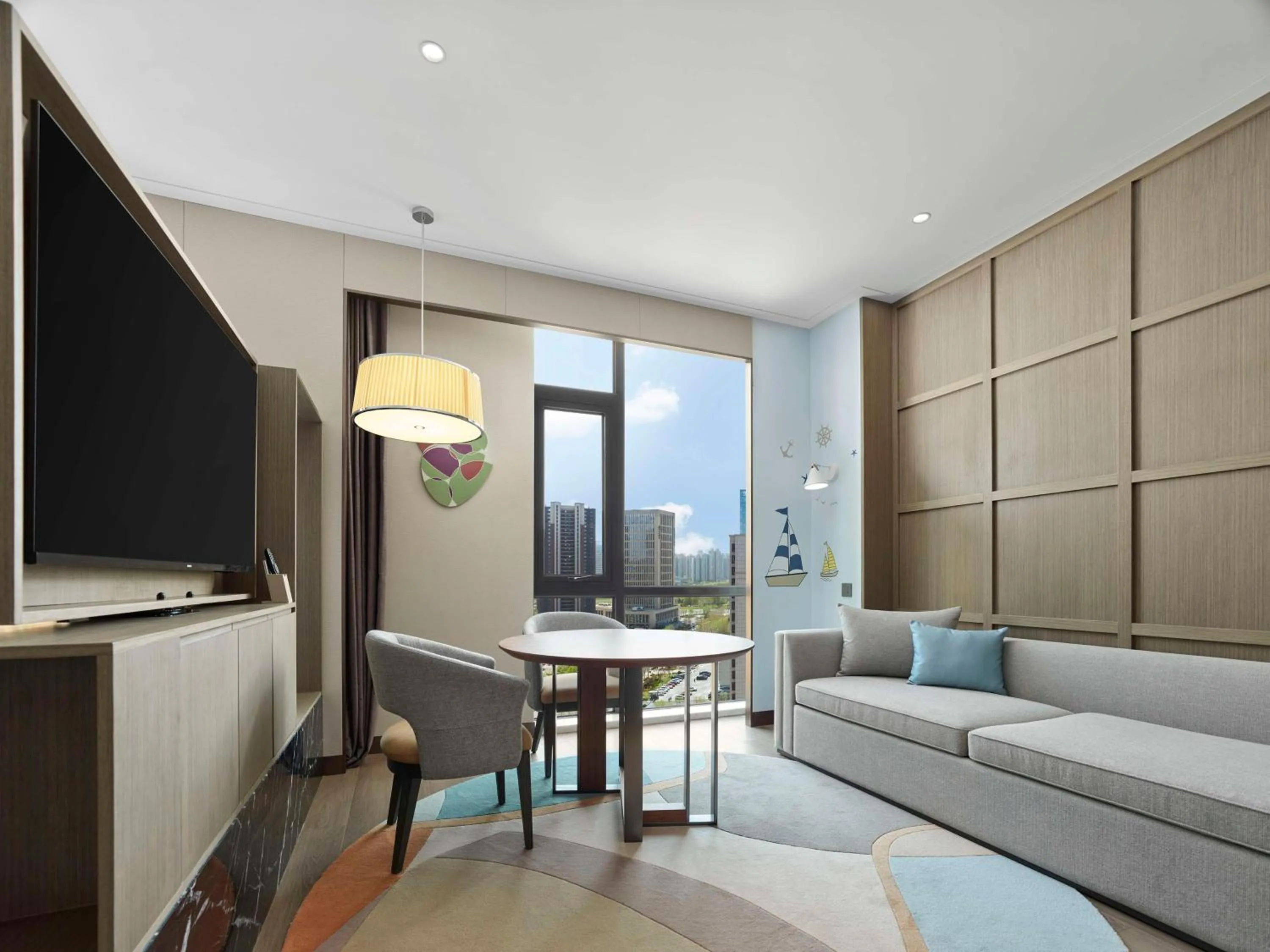 Living room in Doubletree By Hilton Yantai Golden Coast Hotel & Suites