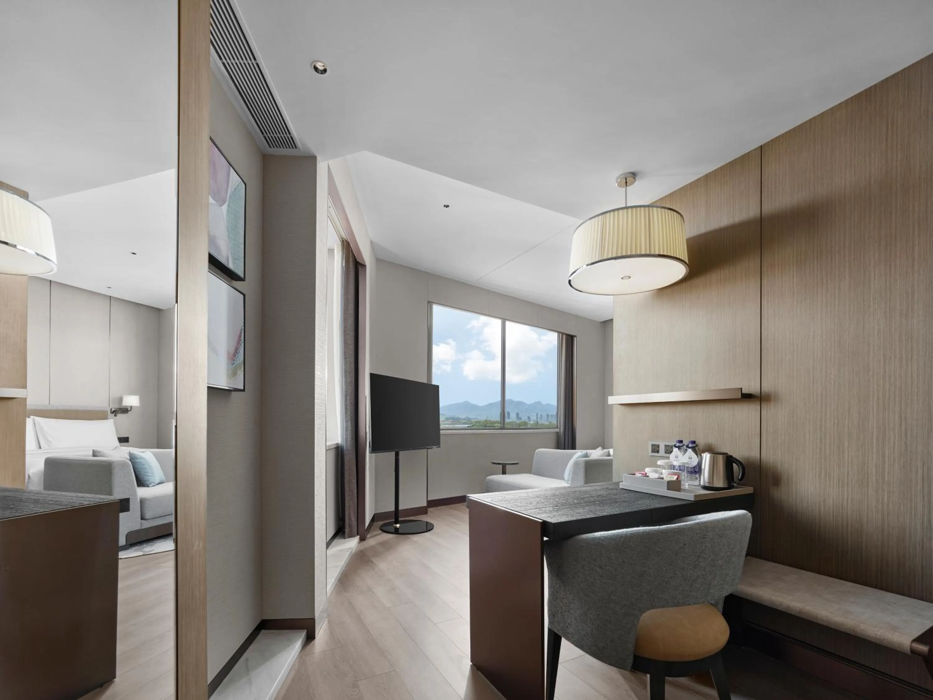 Photo of the whole room in Doubletree By Hilton Yantai Golden Coast Hotel & Suites