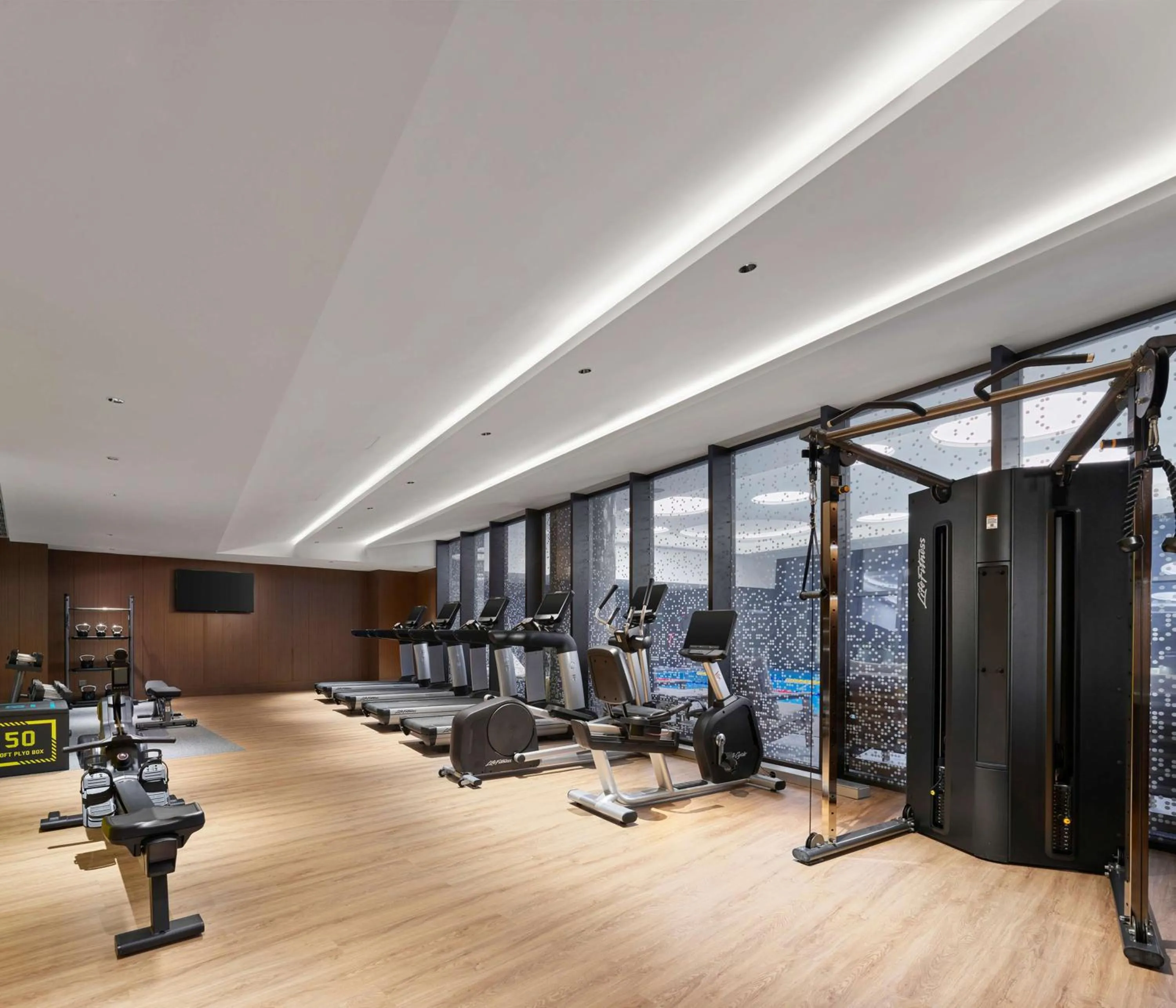 Fitness centre/facilities in Doubletree By Hilton Yantai Golden Coast Hotel & Suites