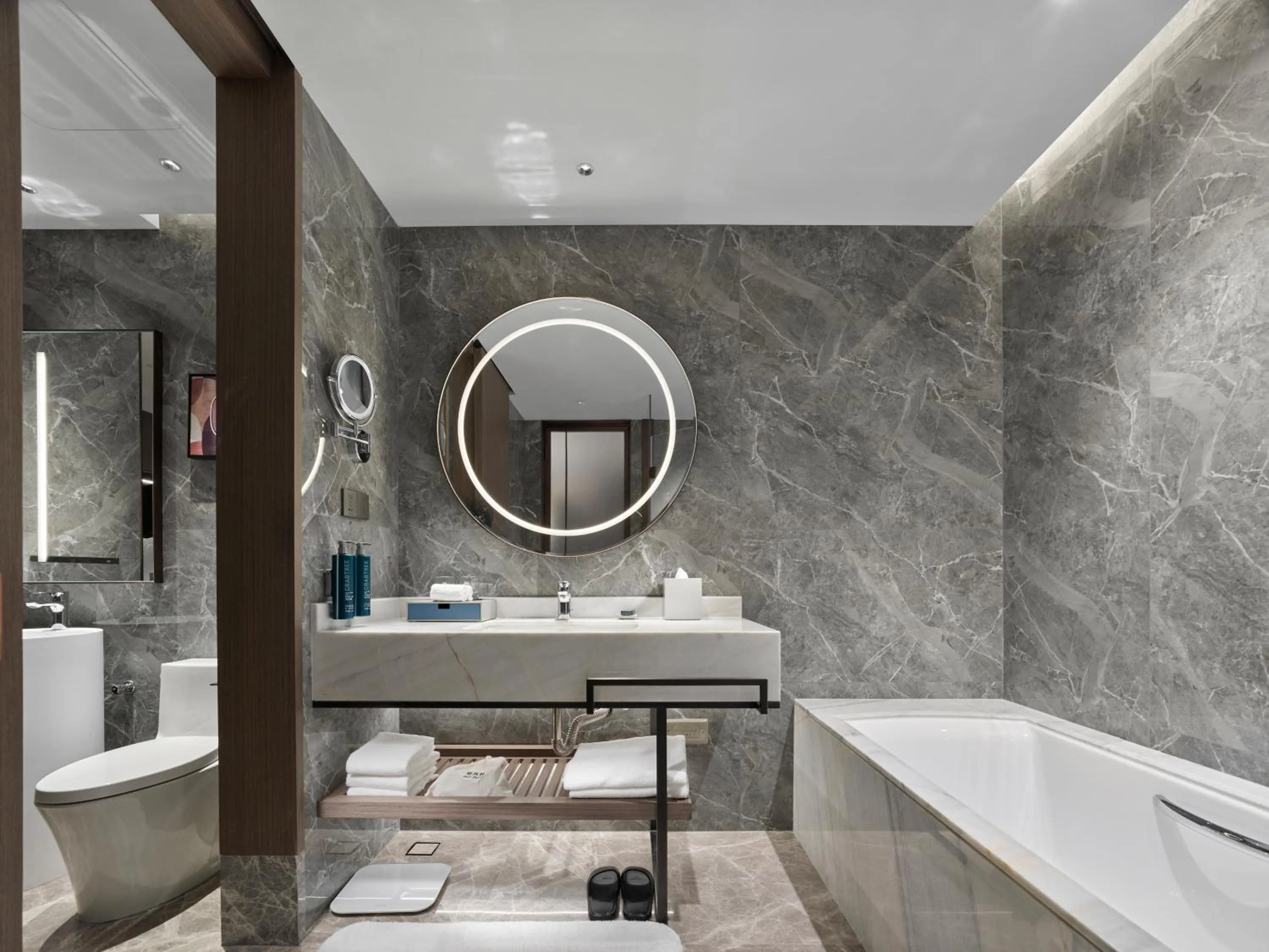 Bathroom in Doubletree By Hilton Yantai Golden Coast Hotel & Suites