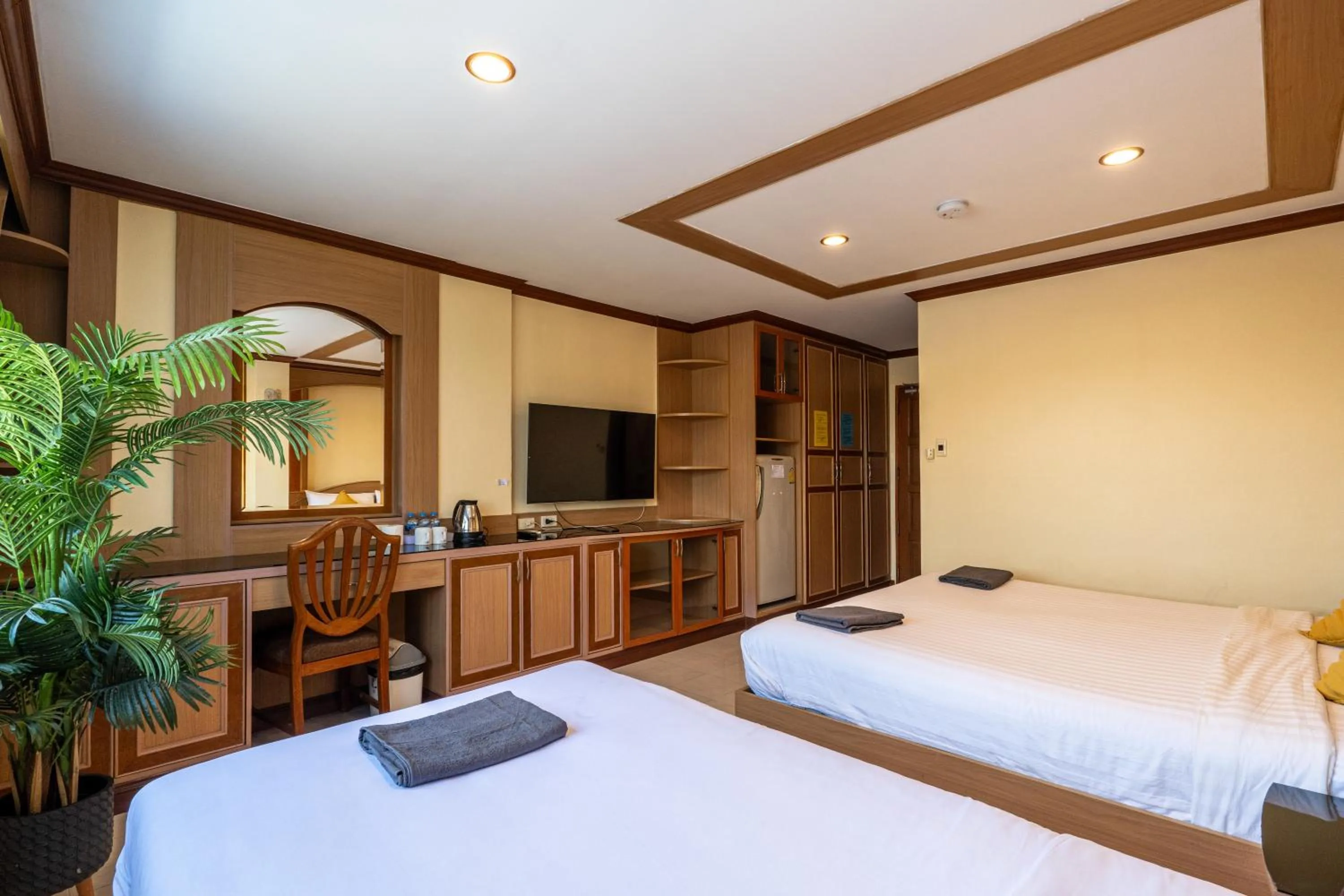 Bed in La Casa South Pattaya Hotel