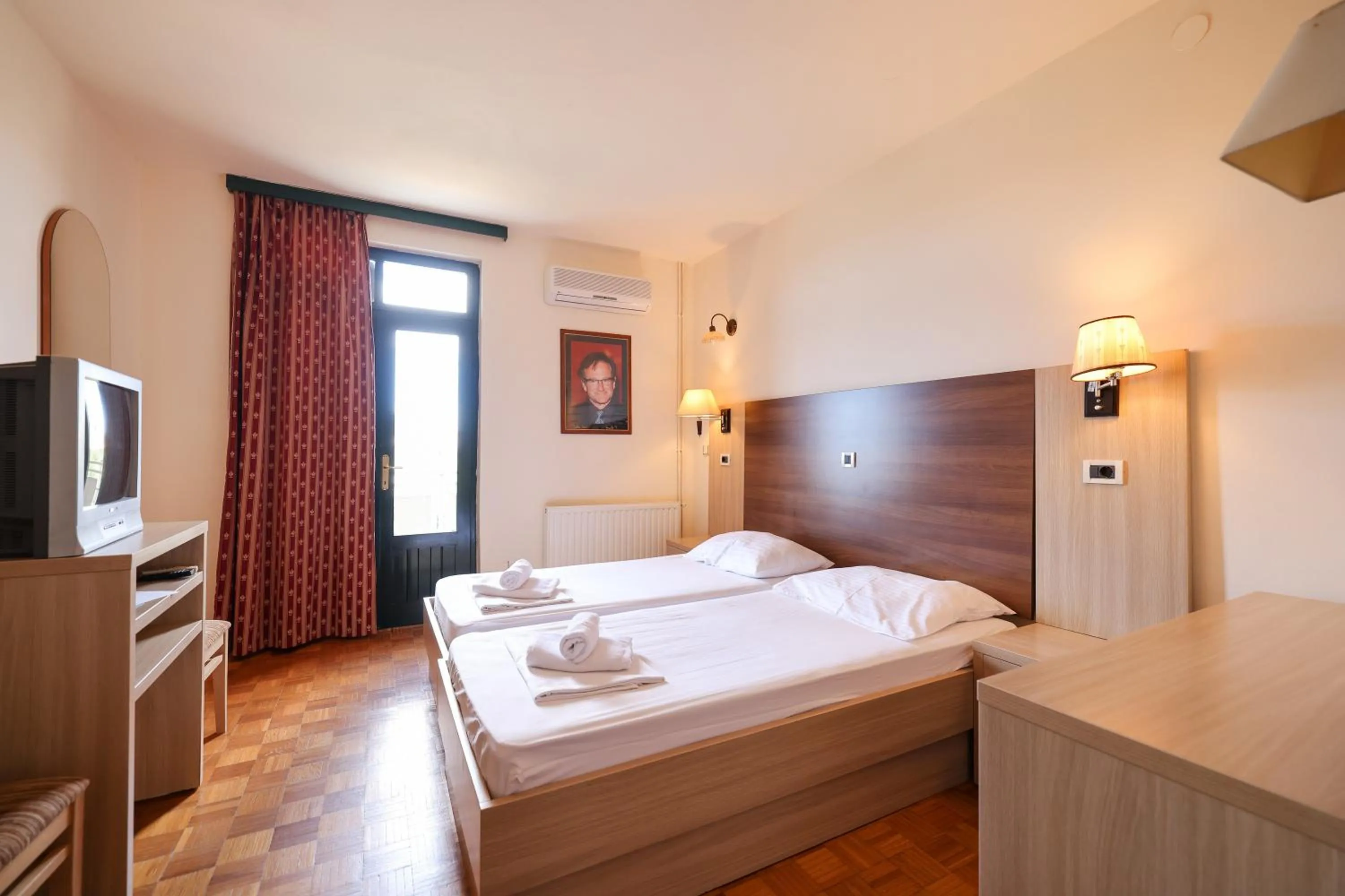 Bed in Tribunia Beach Hotel