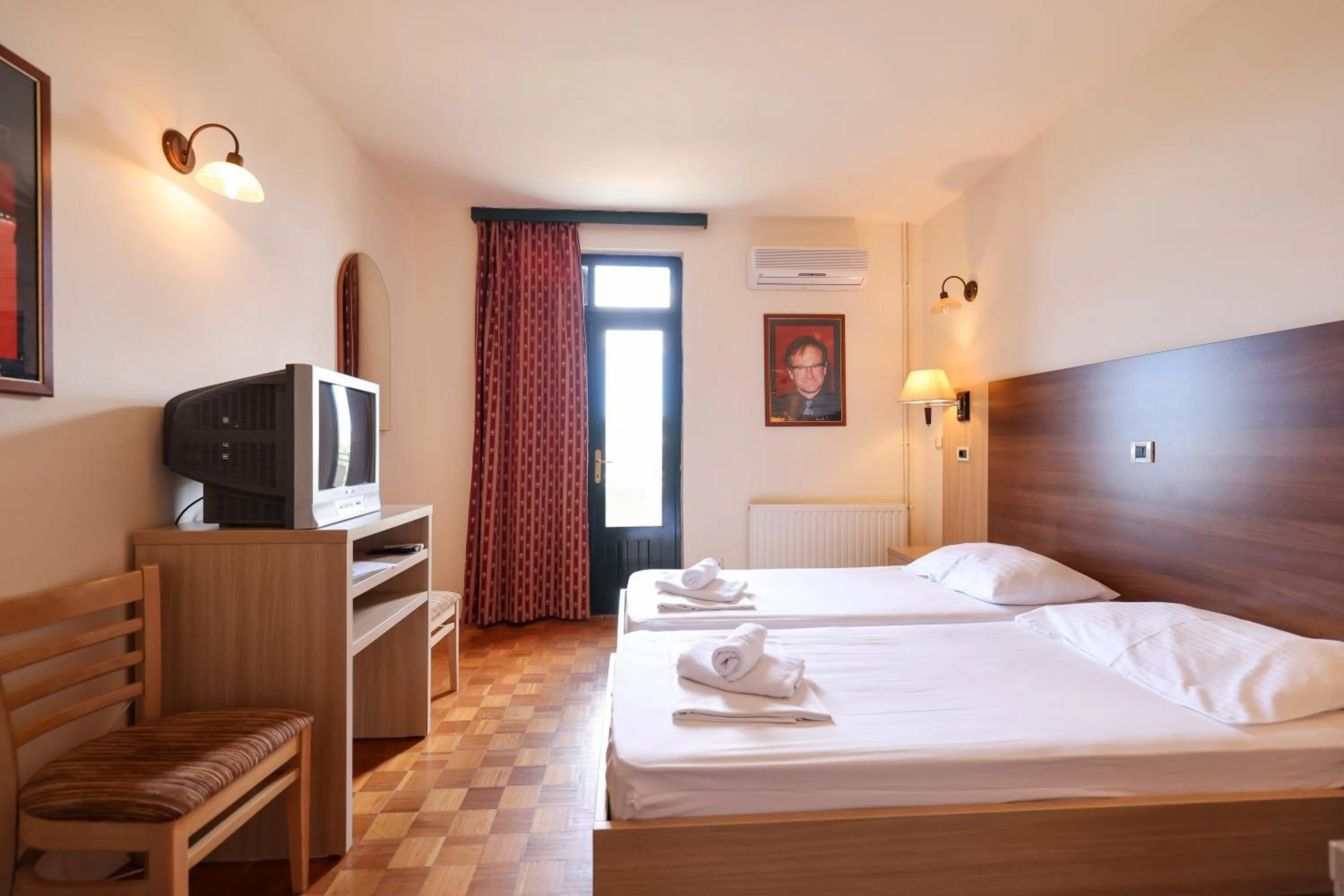 Bed in Tribunia Beach Hotel