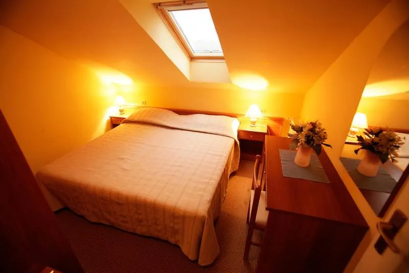 Bed in Tribunia Beach Hotel