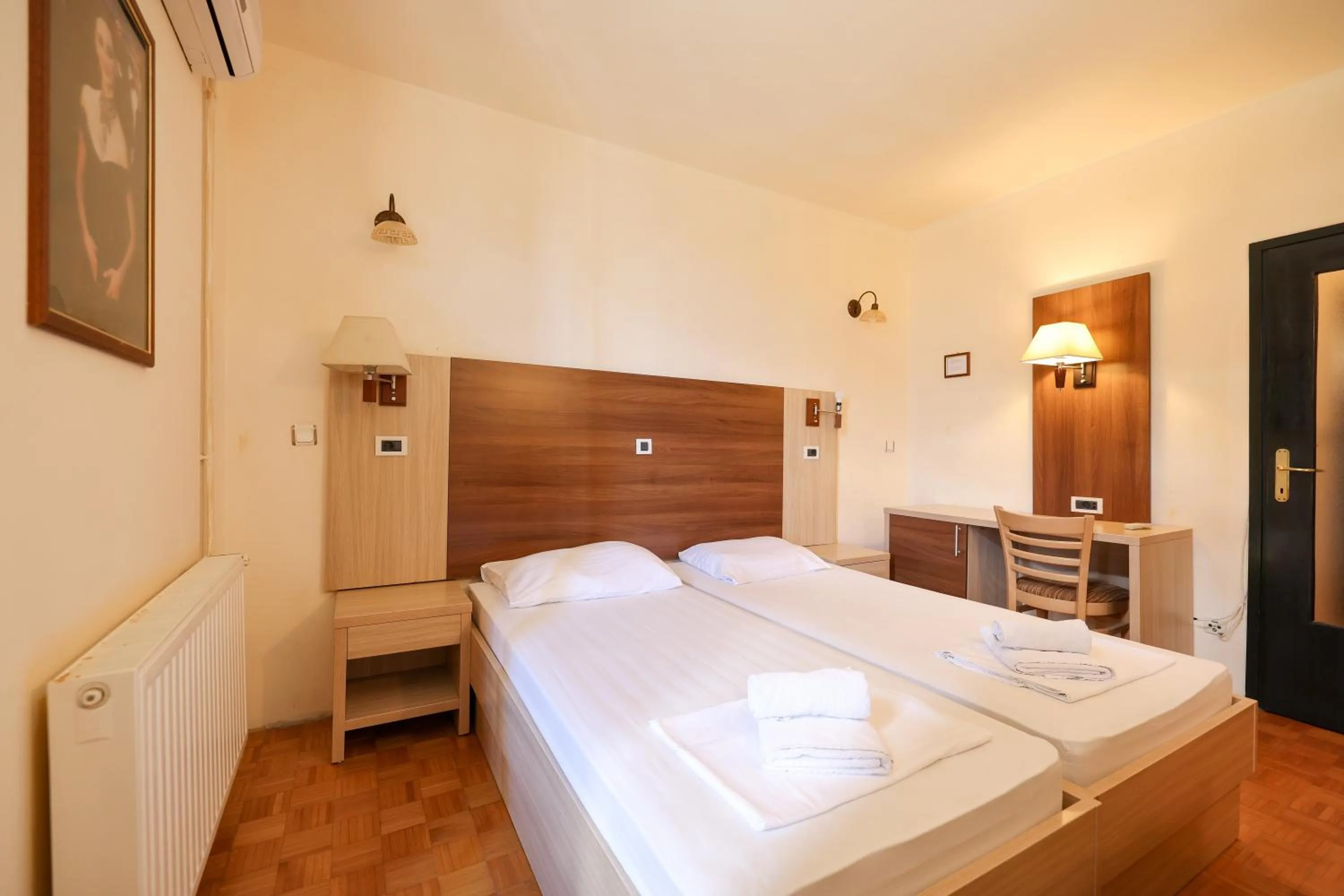 Bed in Tribunia Beach Hotel