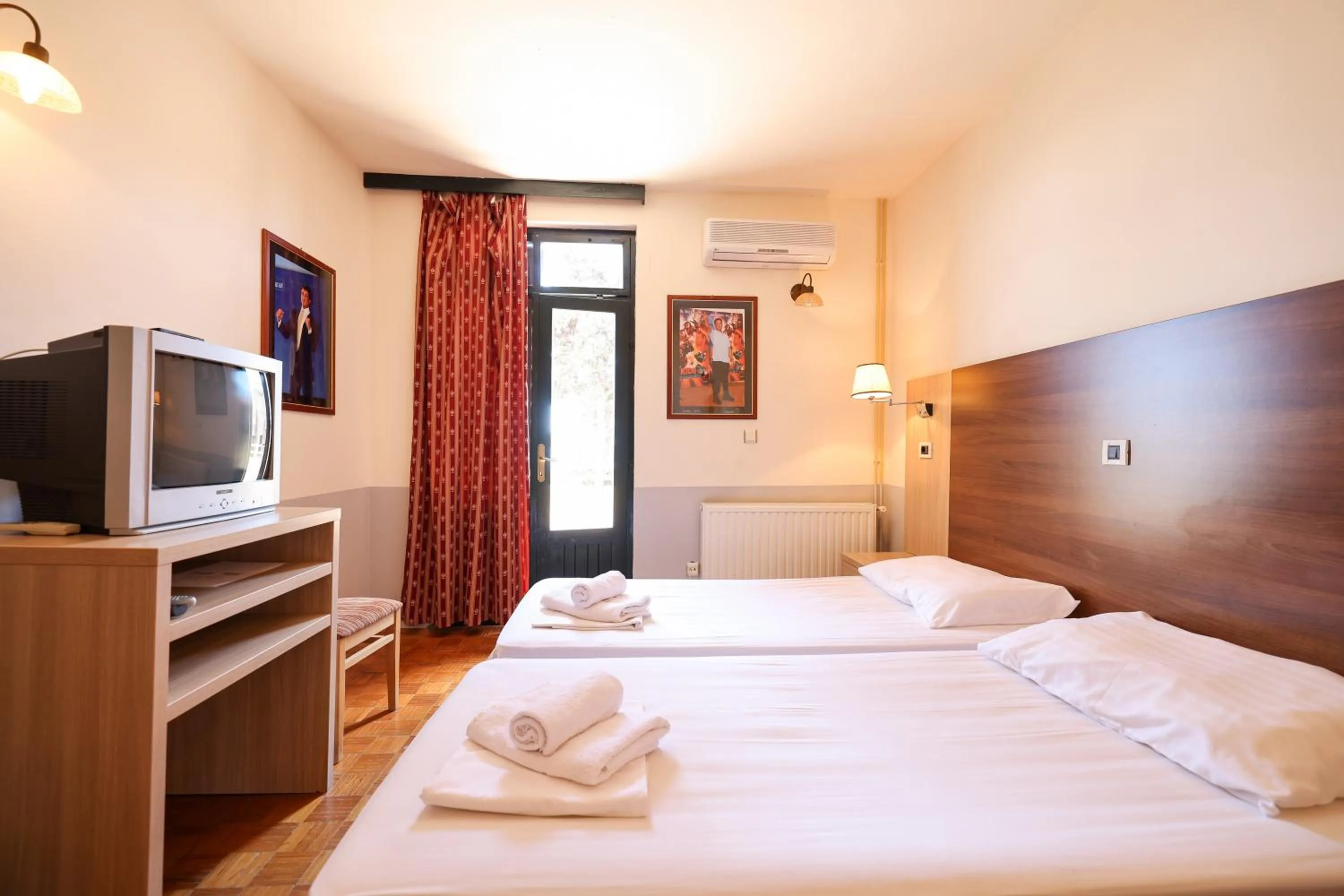 Bed in Tribunia Beach Hotel