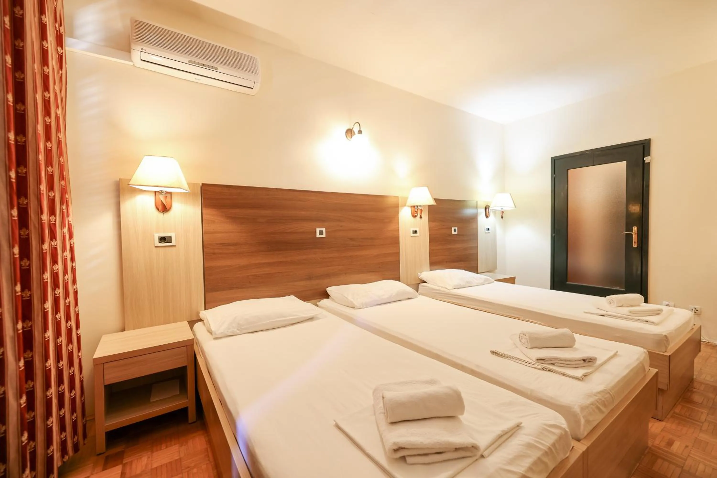 Bed in Tribunia Beach Hotel