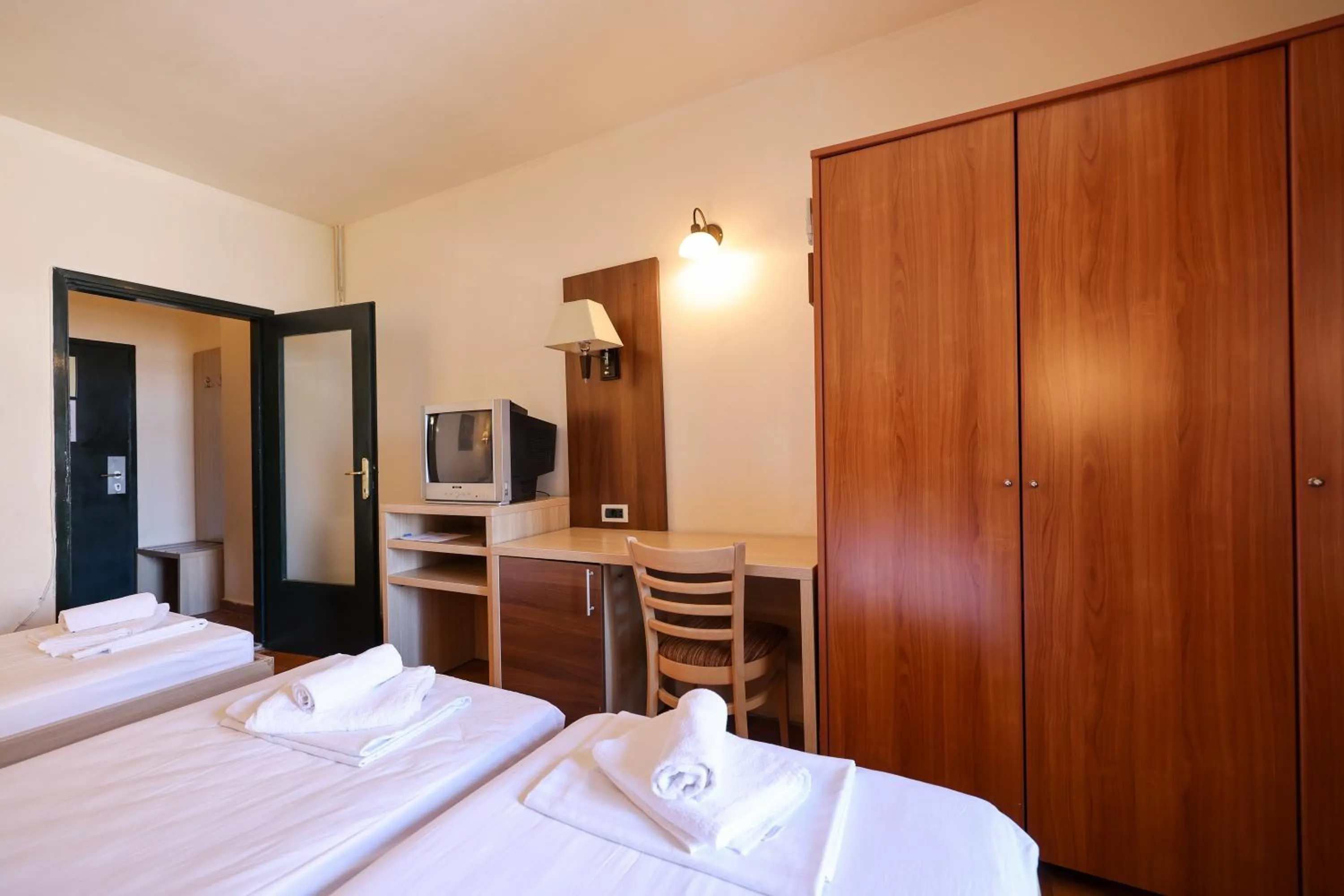 Bed in Tribunia Beach Hotel