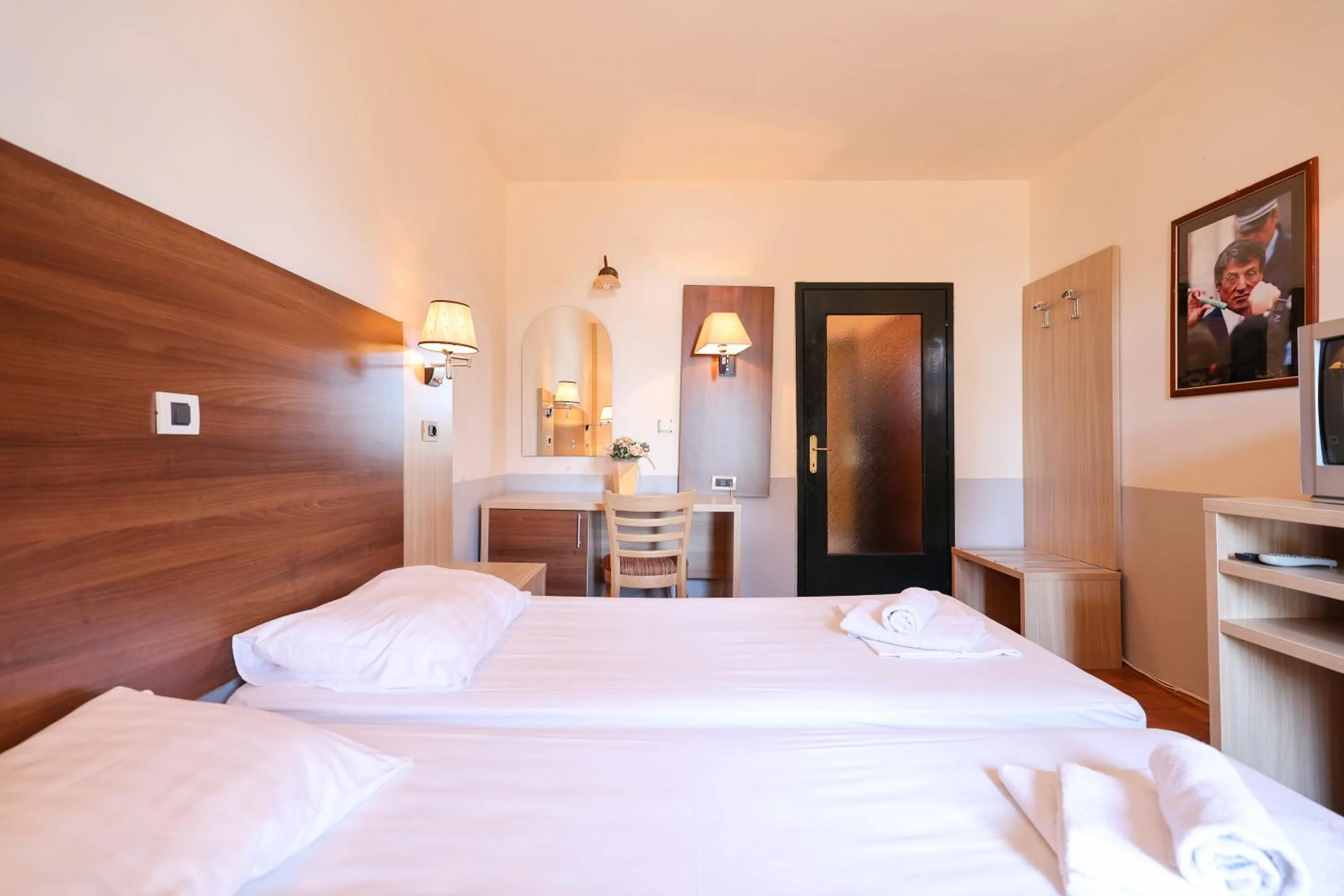 Bed in Tribunia Beach Hotel