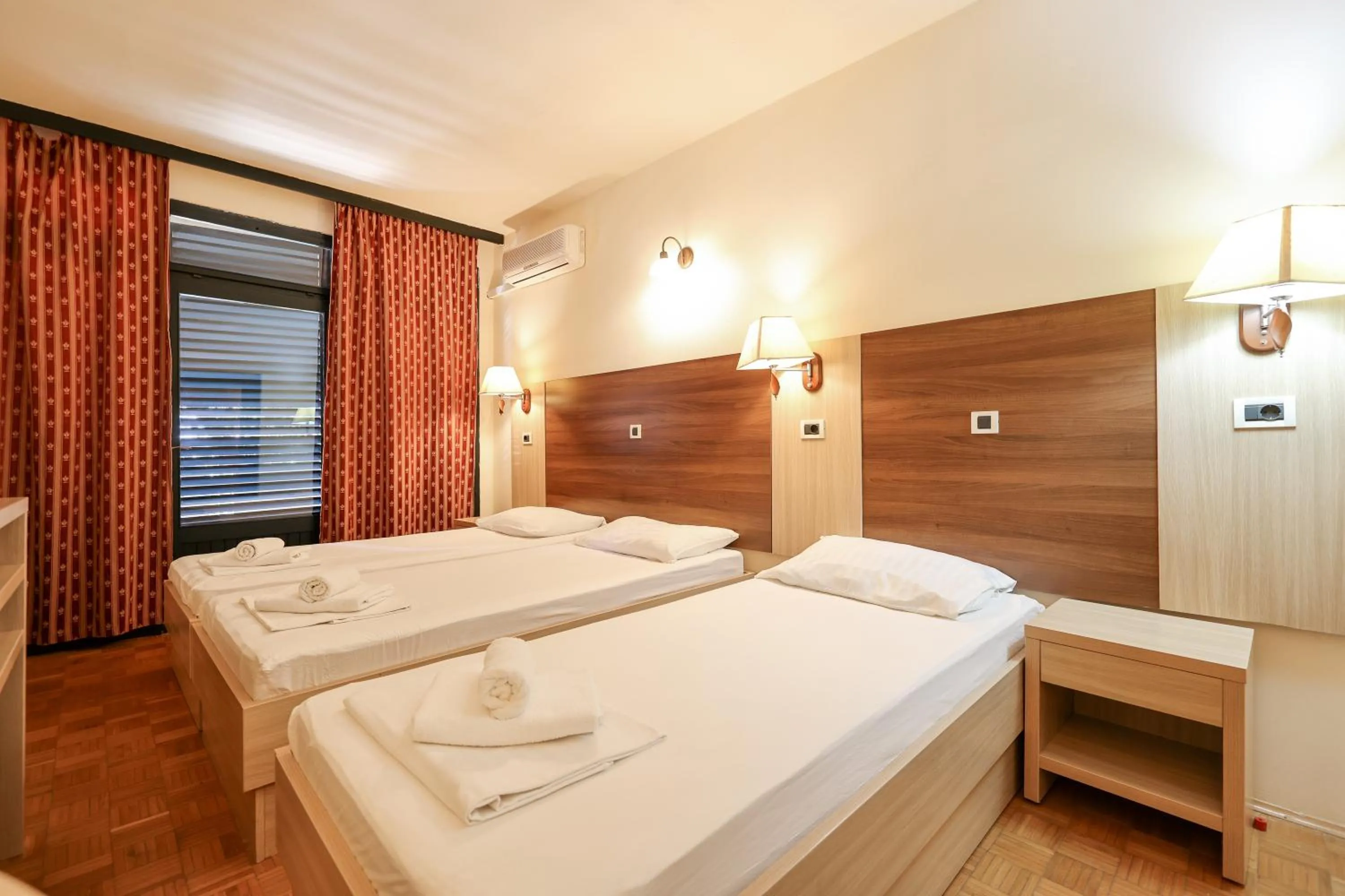 Bed in Tribunia Beach Hotel