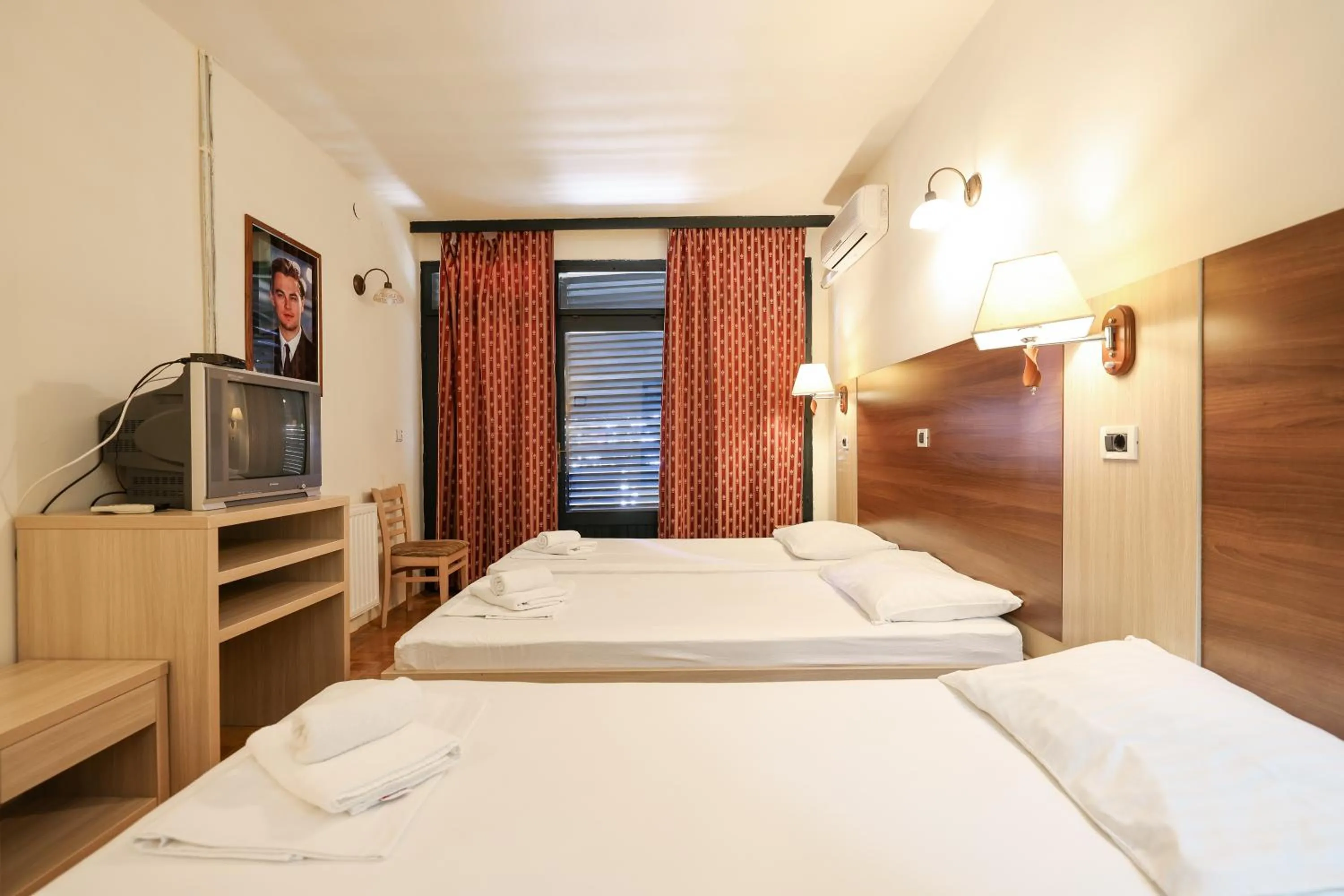 Bed in Tribunia Beach Hotel