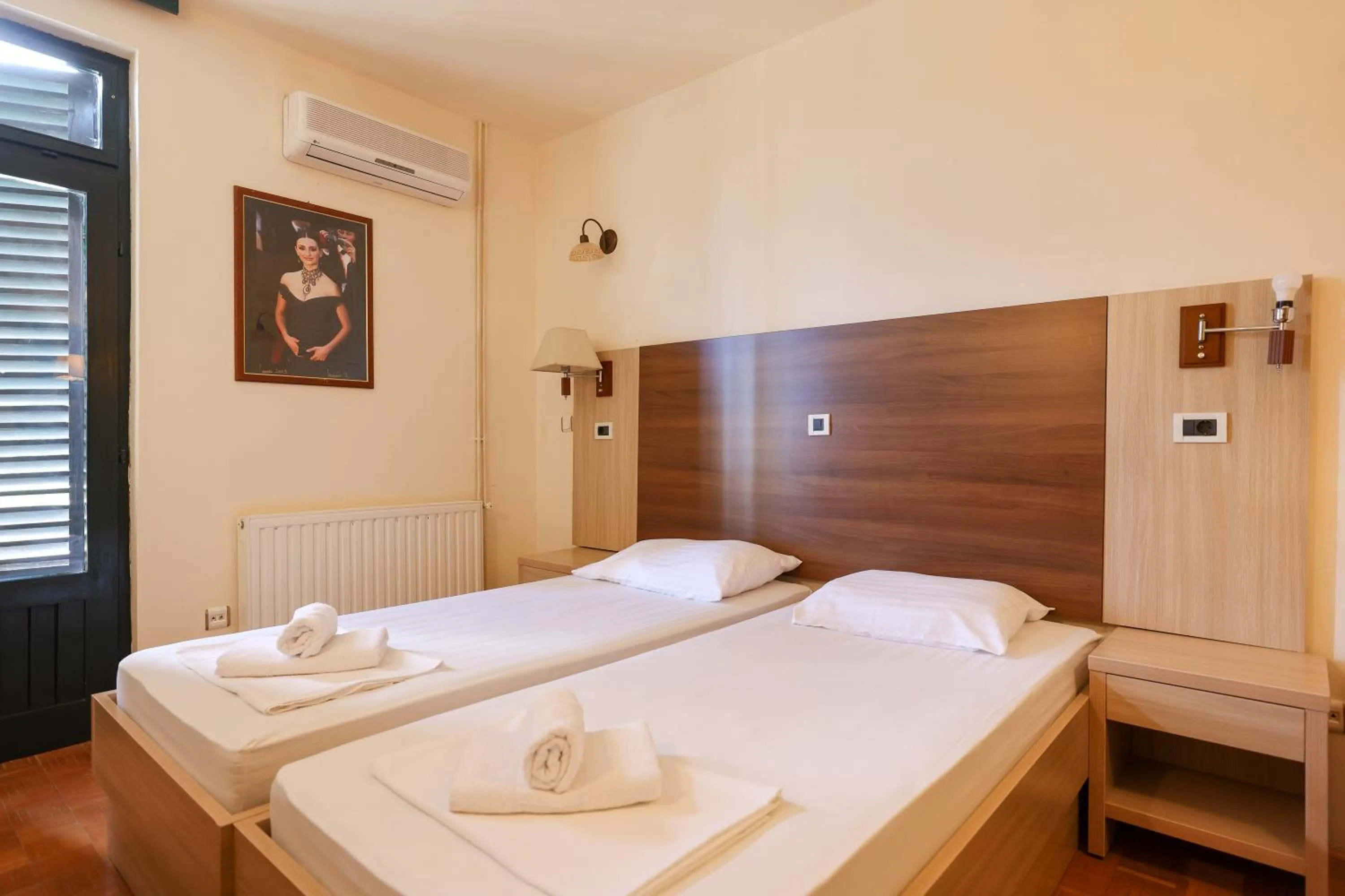Bed in Tribunia Beach Hotel