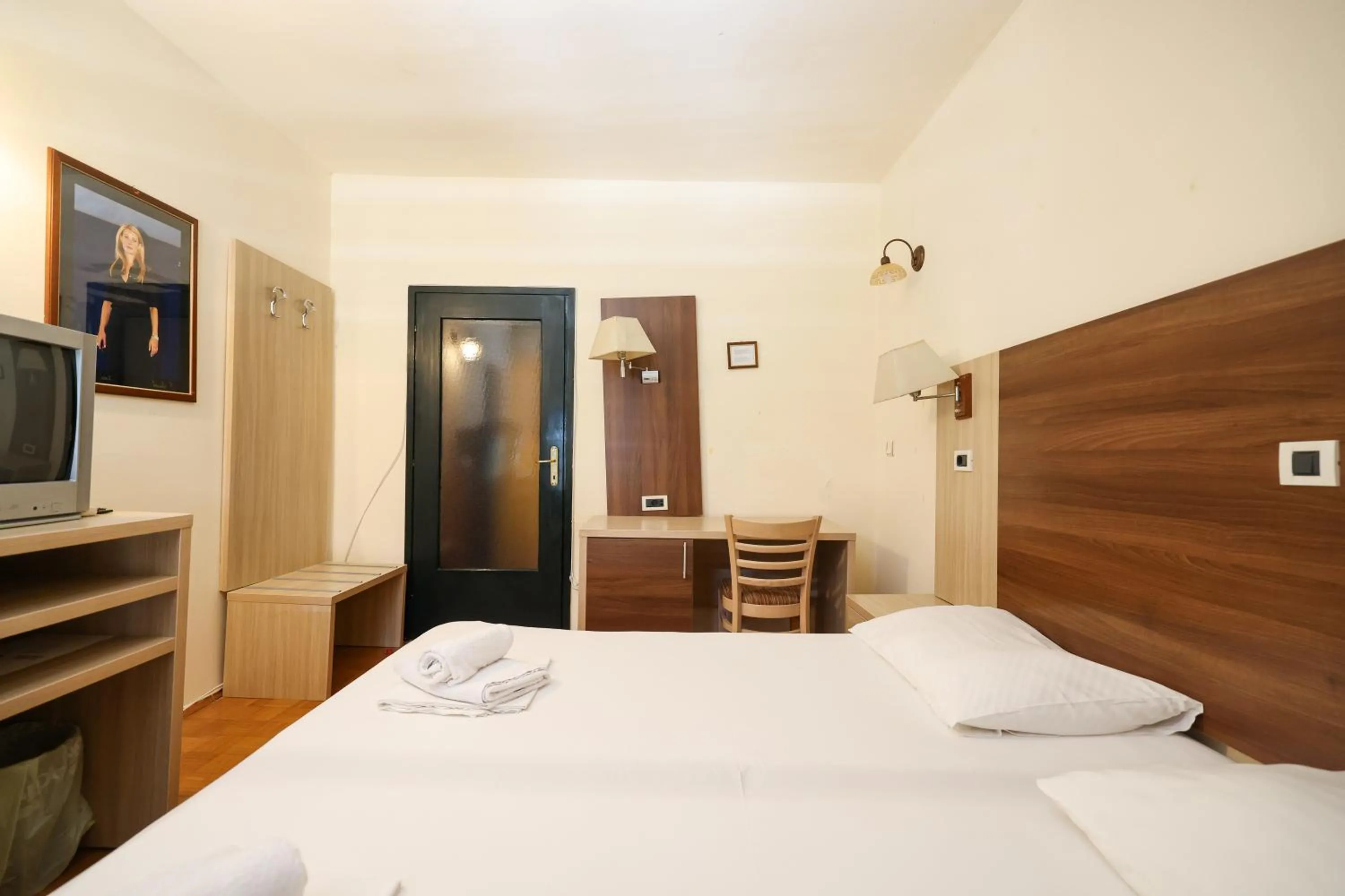 Bed in Tribunia Beach Hotel