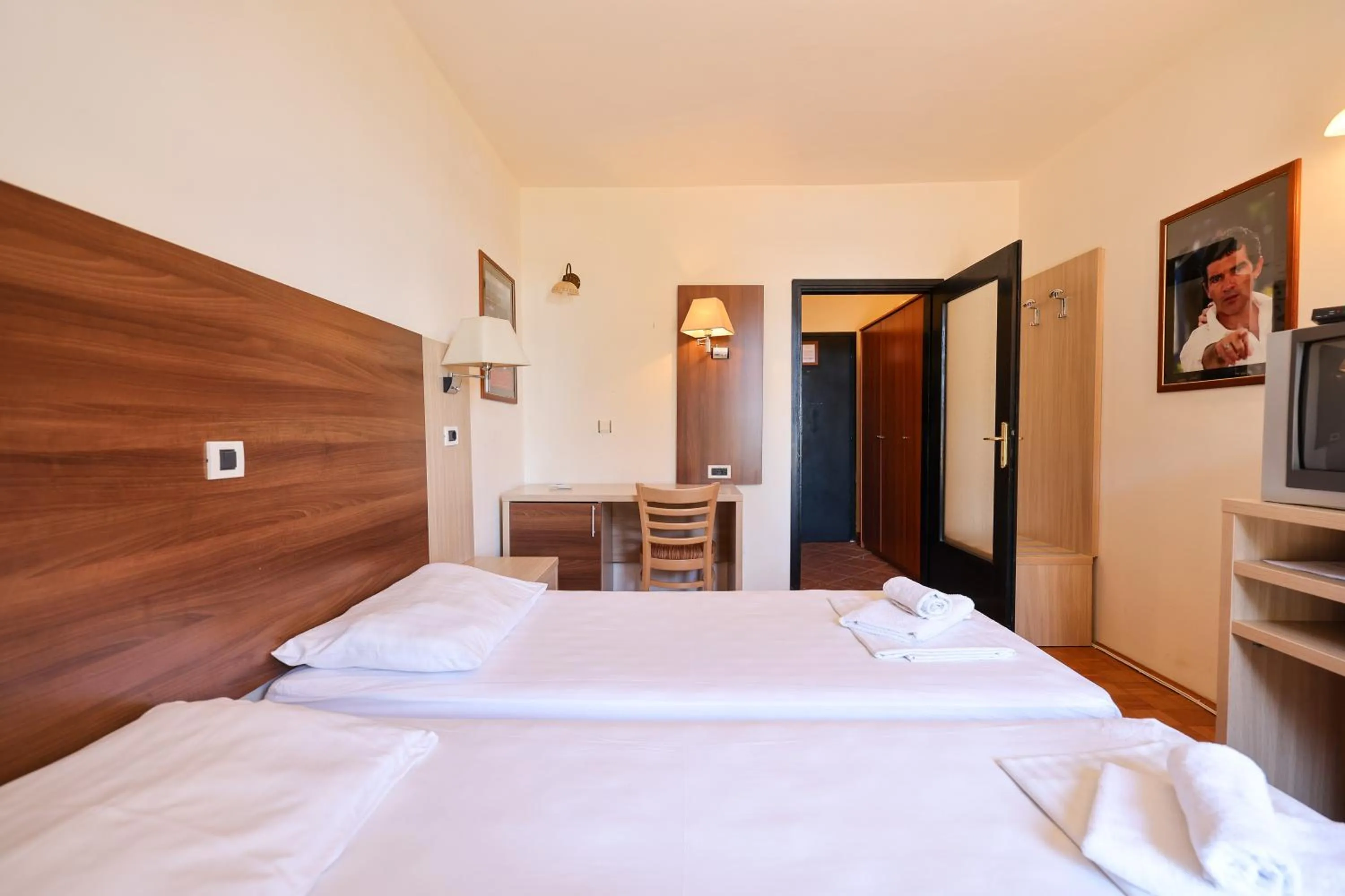 Bed in Tribunia Beach Hotel