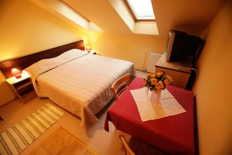 Bed in Tribunia Beach Hotel