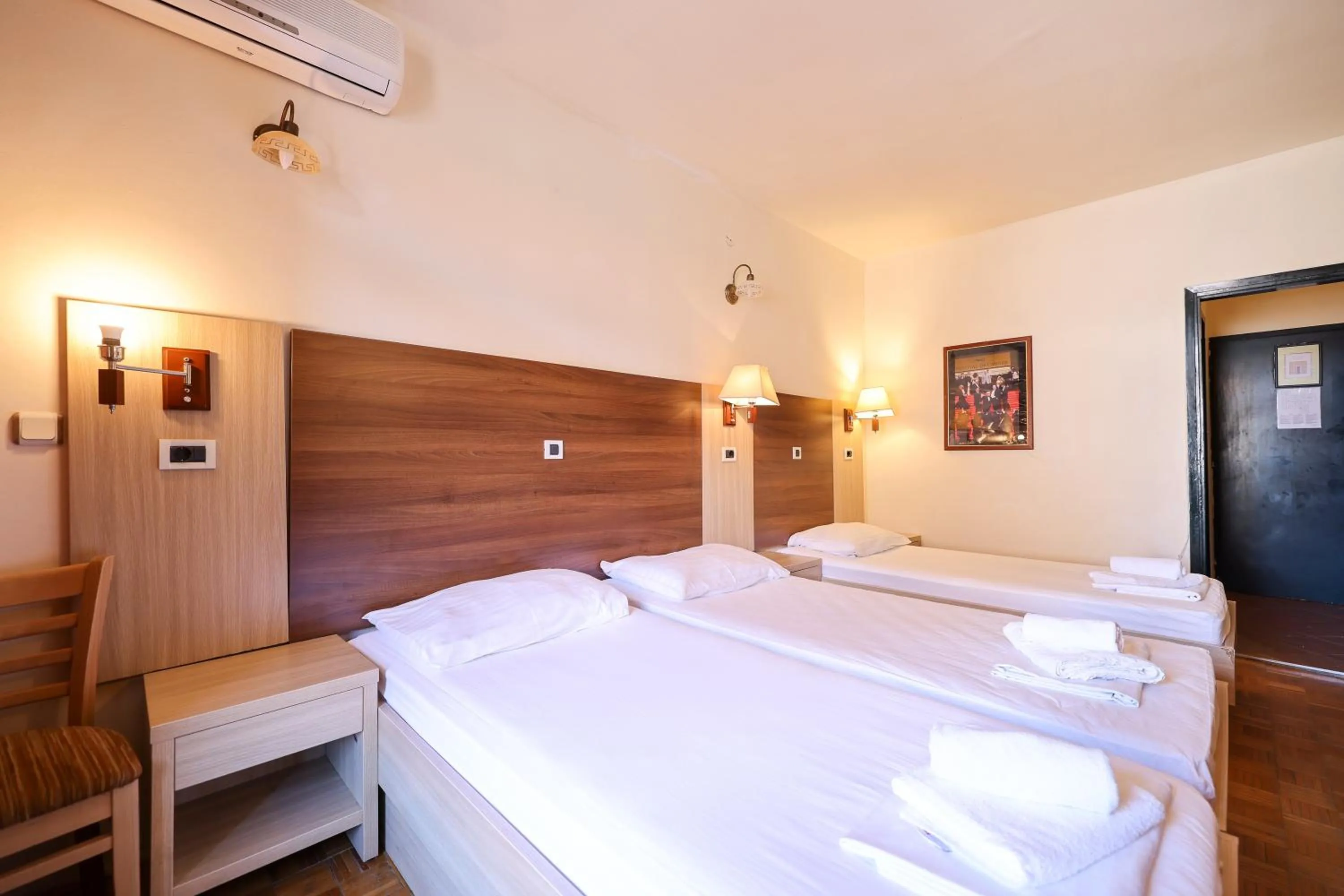 Bed in Tribunia Beach Hotel