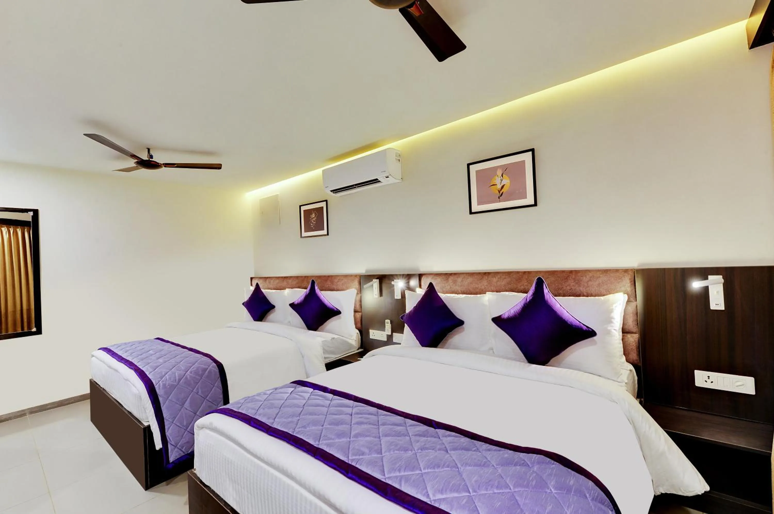 Bed in The Lavender Hotel