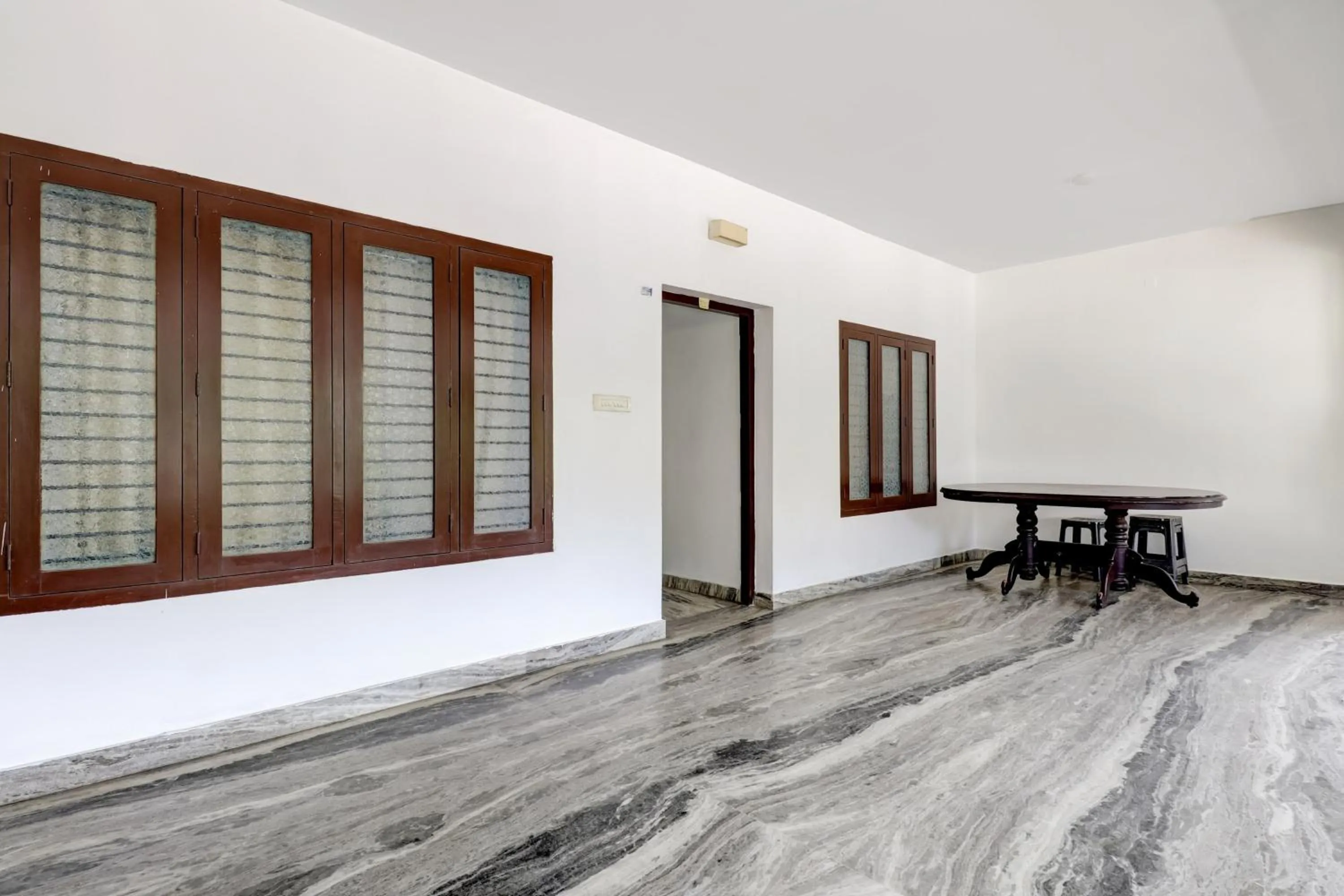 Lobby or reception in Super Hotel O Kazhakoottam Near AL SAJ Convention Centre