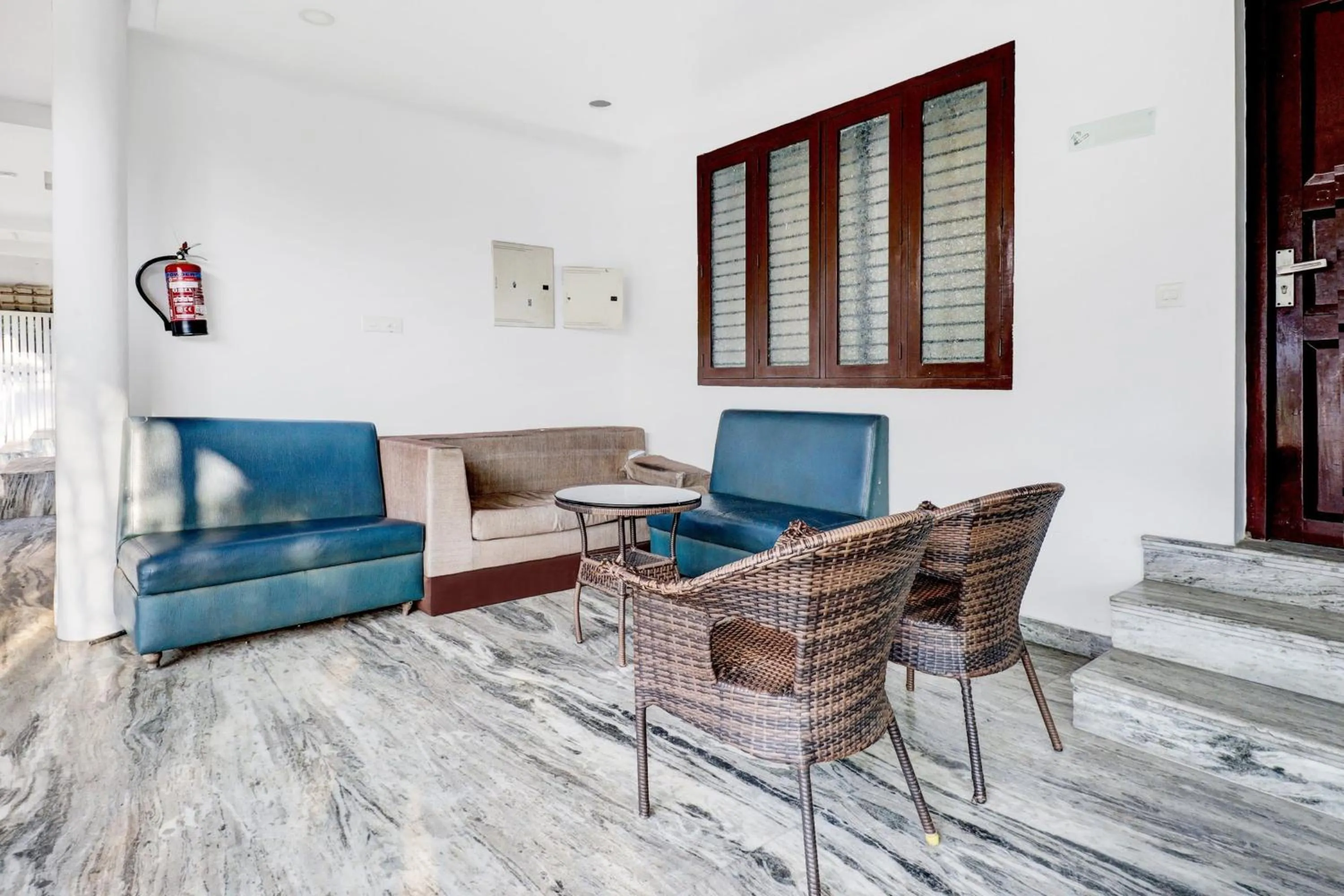 Lobby or reception in Super Hotel O Kazhakoottam Near AL SAJ Convention Centre