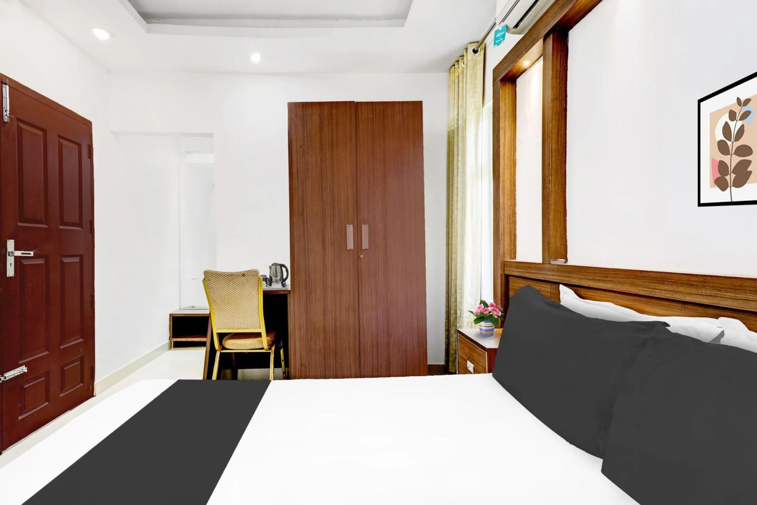 Bedroom, Bed in Super Hotel O Kazhakoottam Near AL SAJ Convention Centre