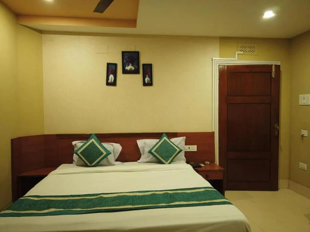 Bed in Hotel Vinayak
