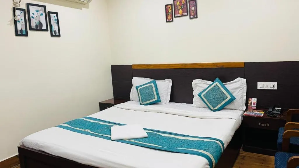 Bed in Hotel Vinayak