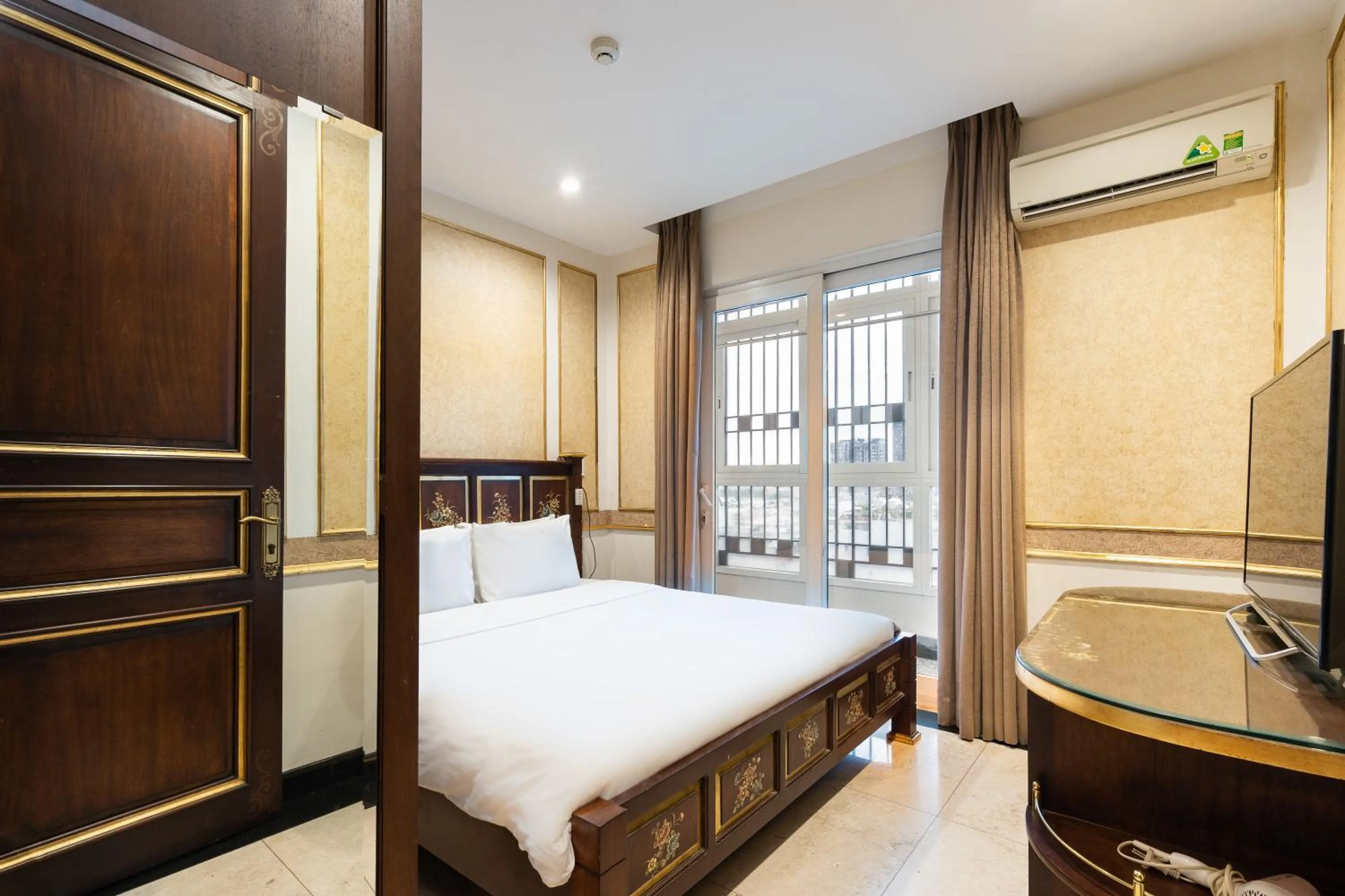 Kitchen or kitchenette, Bed in Nicecy Hotel - Apartment Sai Gon City