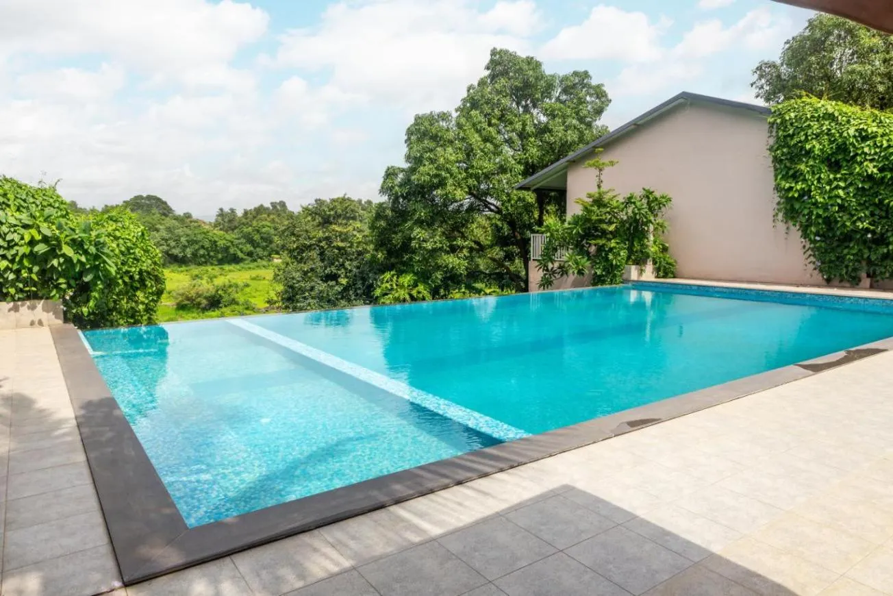 Swimming pool in River Estates Resort, Restaurant & Spa by Vibescapes