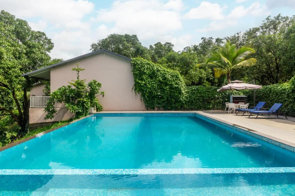 Swimming pool in River Estates Resort, Restaurant & Spa by Vibescapes