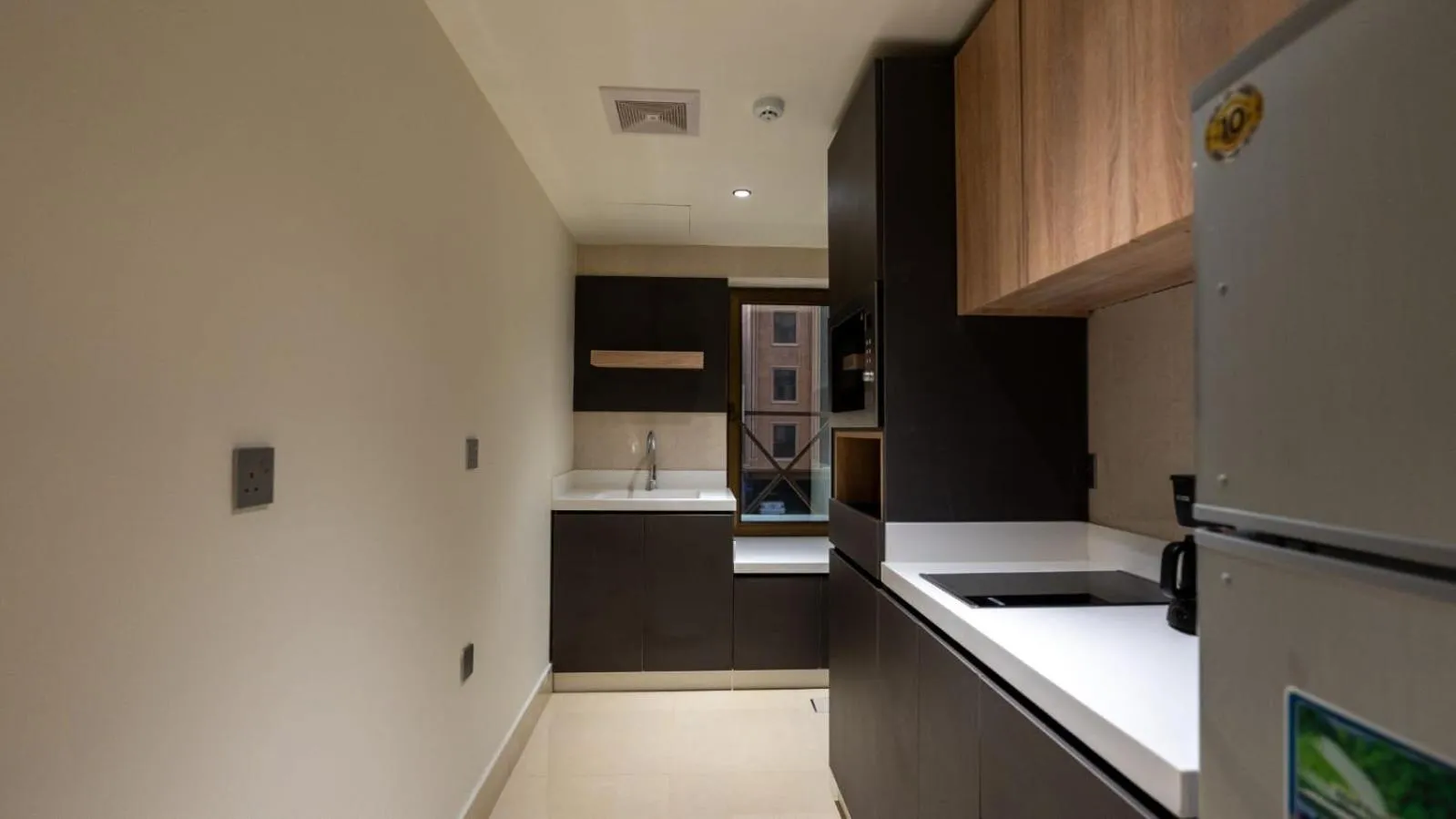 Kitchen or kitchenette in Maskan Alolya Serviced Apartment
