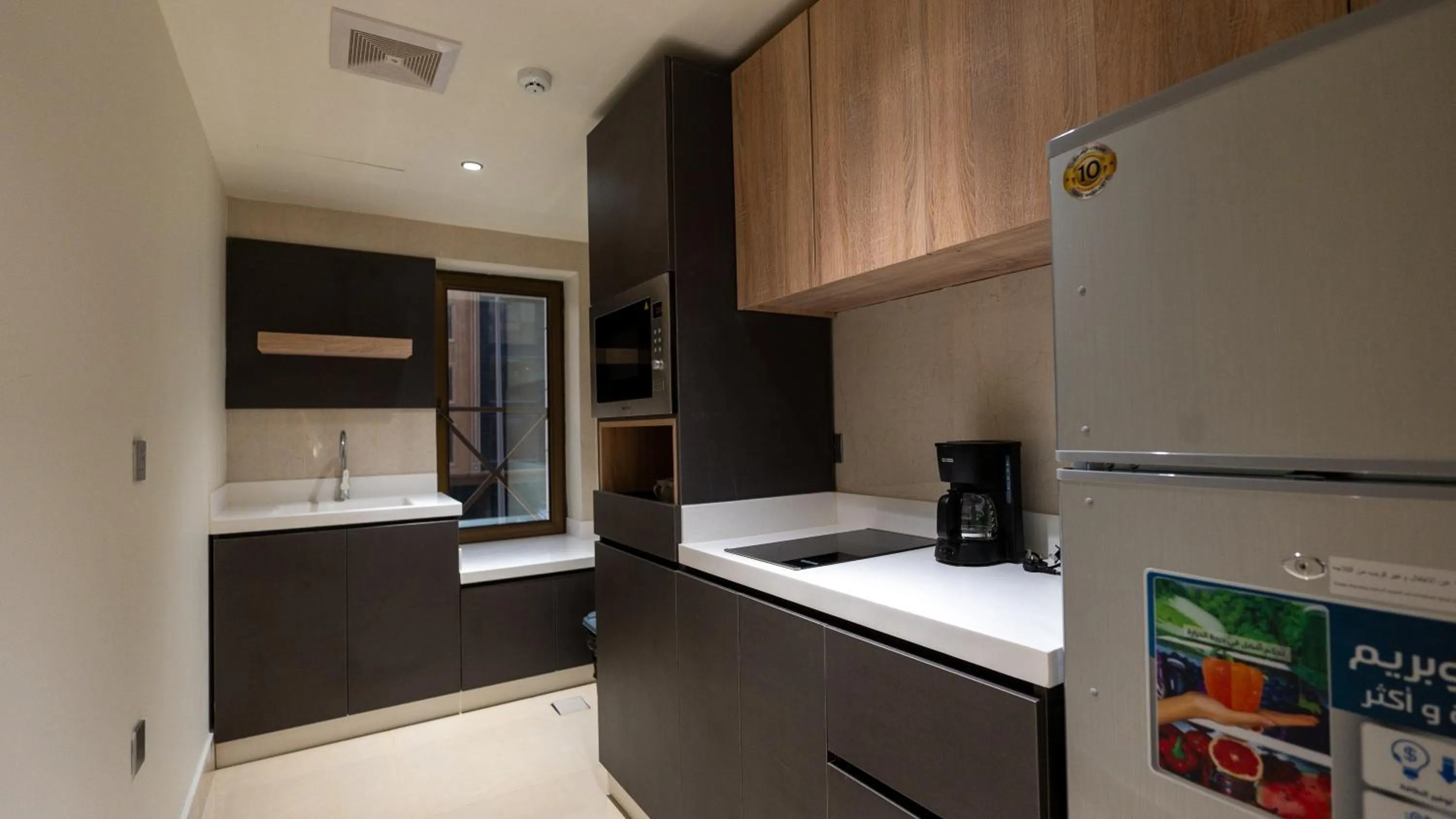 Kitchen or kitchenette in Maskan Alolya Serviced Apartment