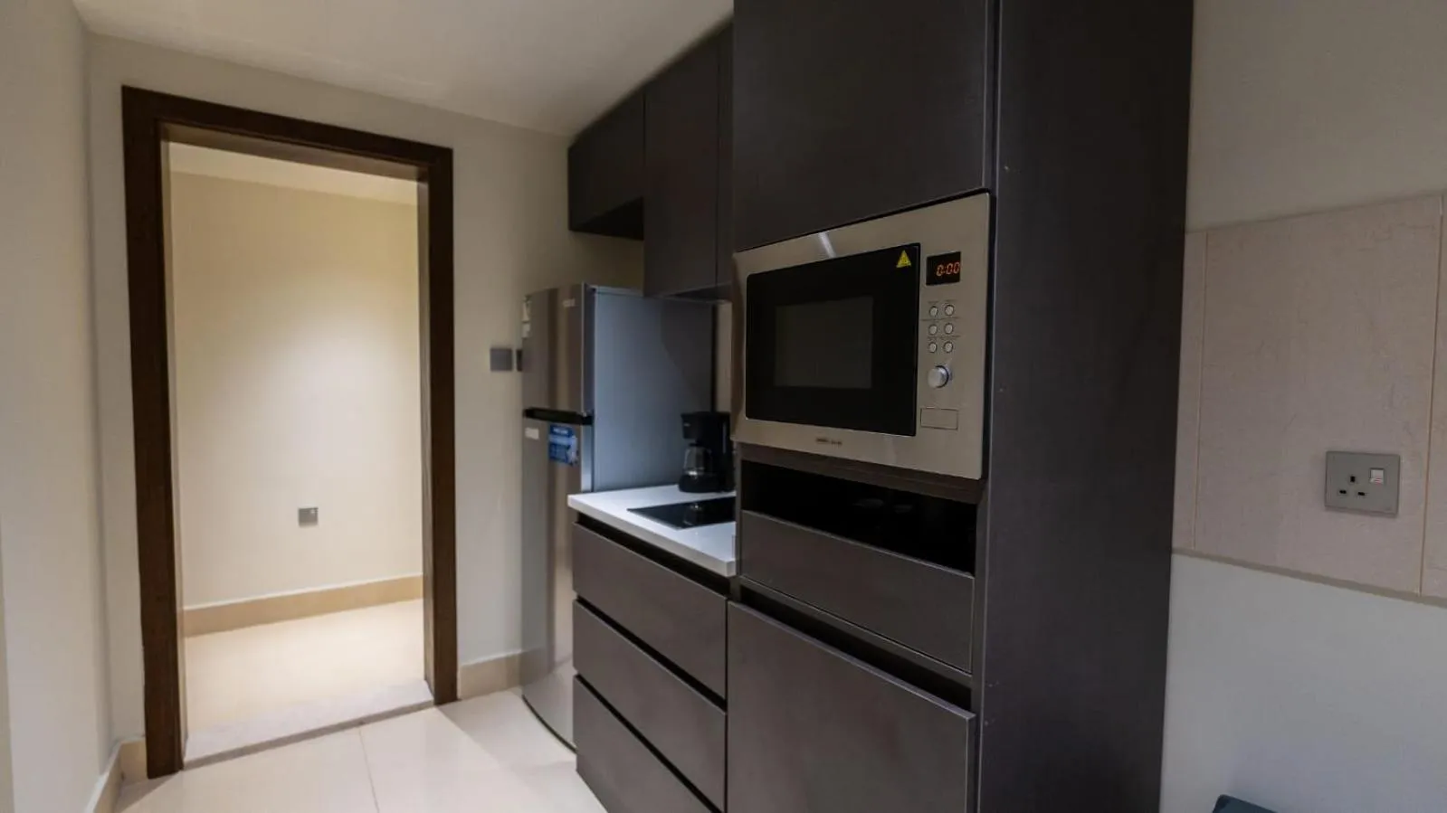 Kitchen or kitchenette in Maskan Alolya Serviced Apartment