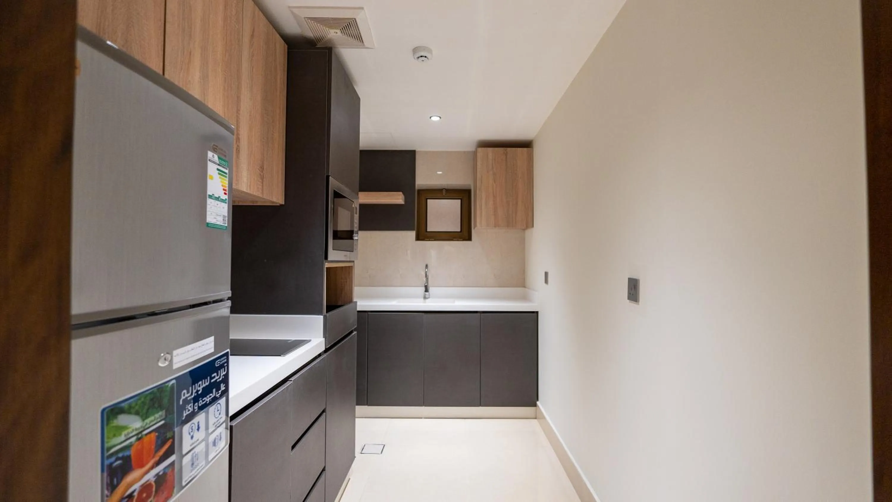 Kitchen or kitchenette in Maskan Alolya Serviced Apartment