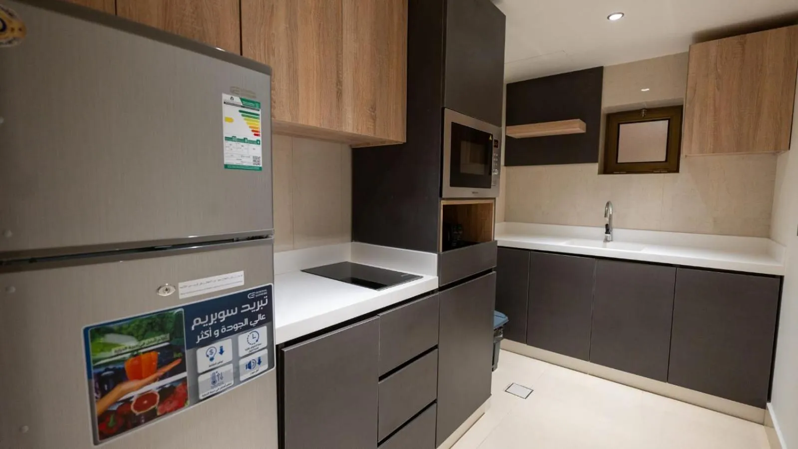 Kitchen or kitchenette in Maskan Alolya Serviced Apartment