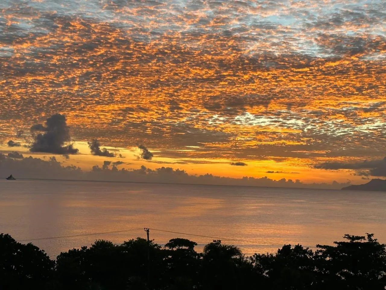 Sunset in Summer Sand Holiday Apartments
